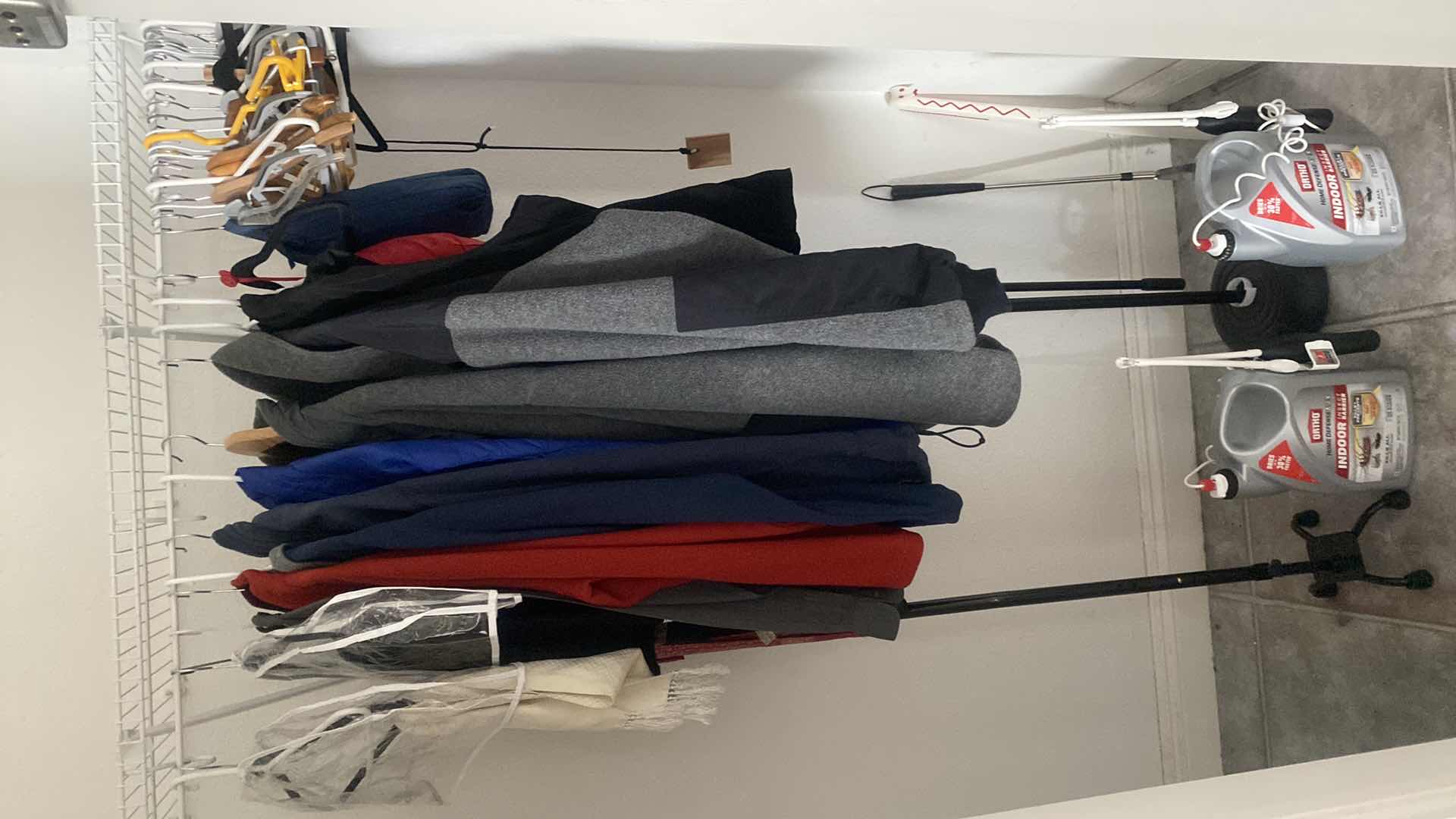 Photo 1 of CONTENTS HALL TO GARAGE CLOSET - MENS CLOTHING SIZES L AND XL & BUG SPRAY