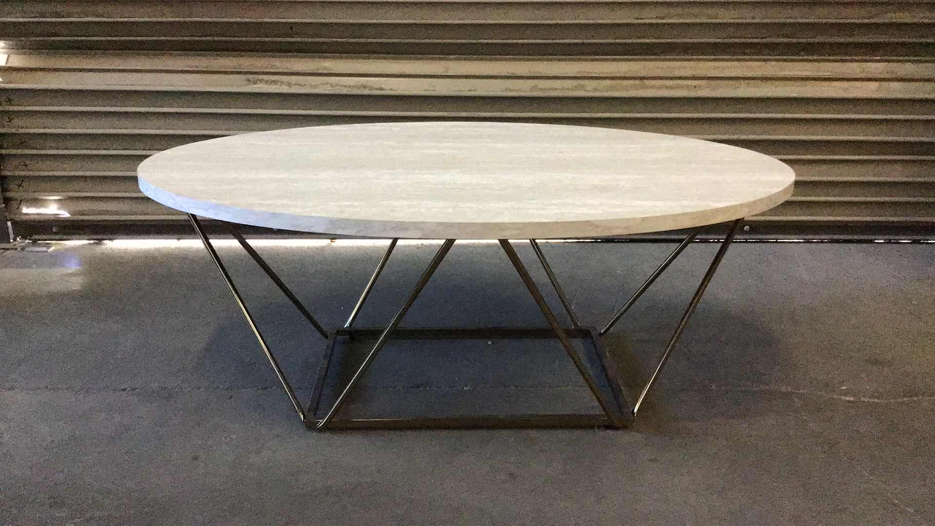 Photo 1 of ASHLEY FURNITURE TARICA MARBLE FINISH TABLE 47” X 31” H18"