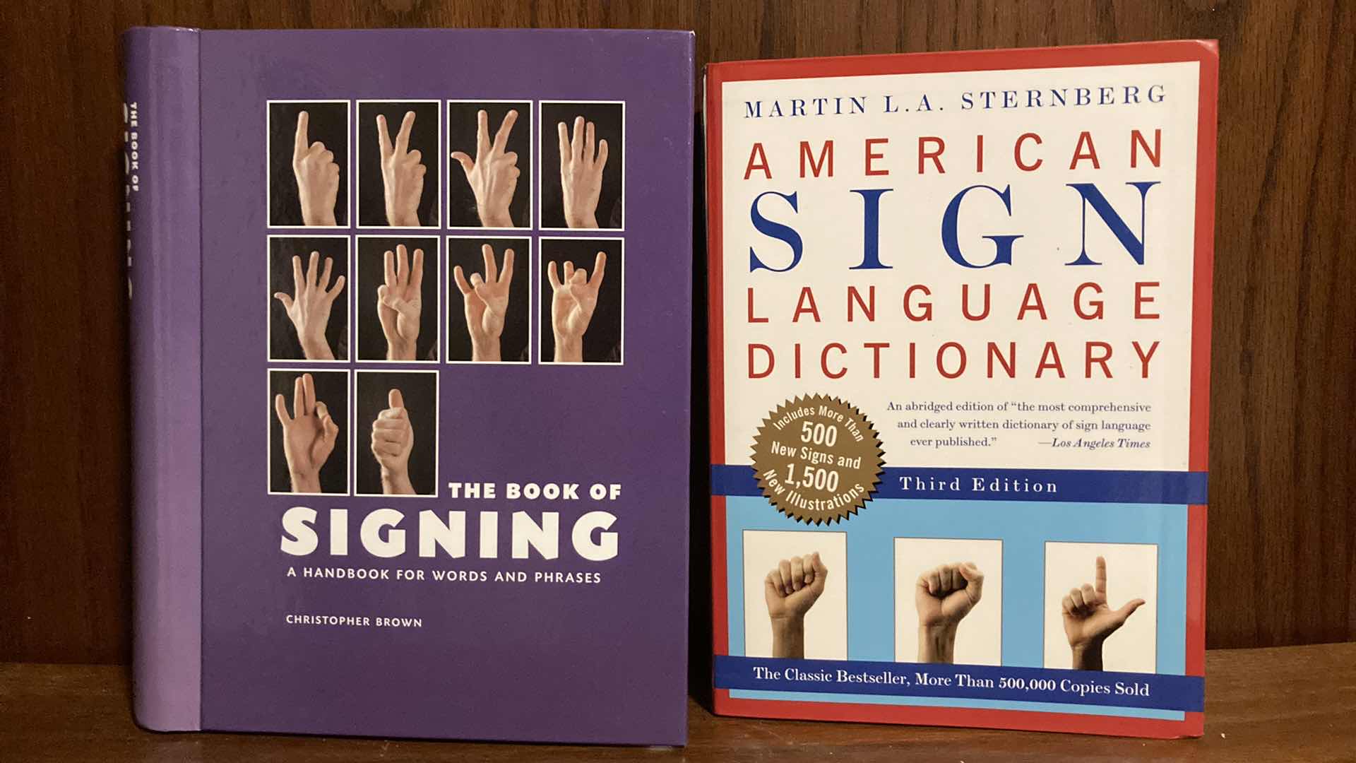 Photo 1 of THE BOOK OF SIGNING & AMERICAN SIGN LANGUAGE DICTIONARY BOOKS