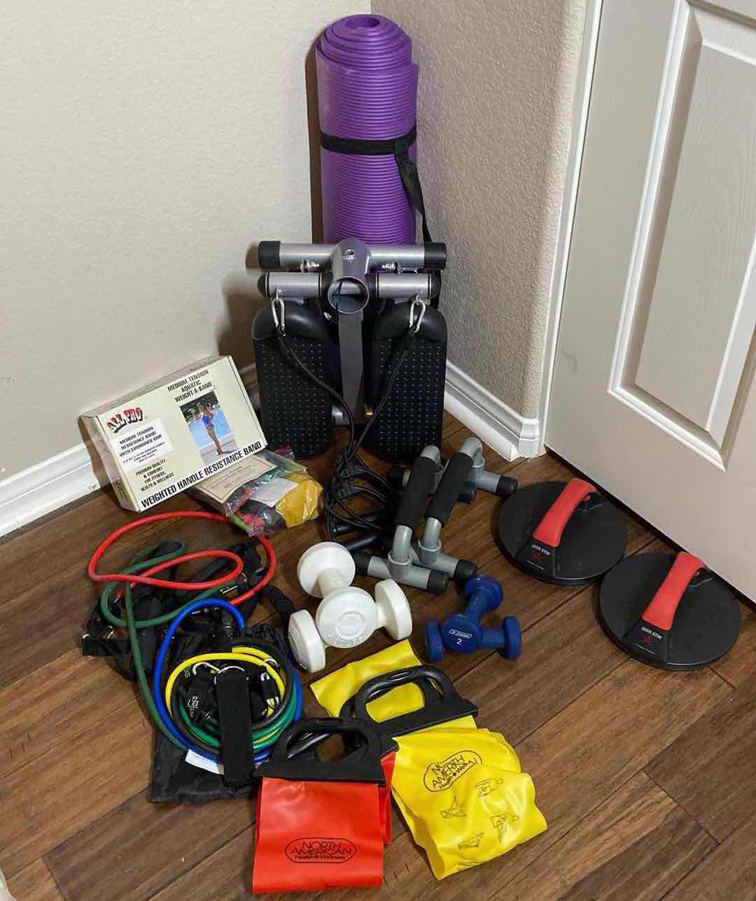 Photo 1 of HOME EXERCISE EQUIPMENT- RESISTANT BANDS, PUSH UP HANDLES, CARDIO DUMBBELLS & YOGA MAT