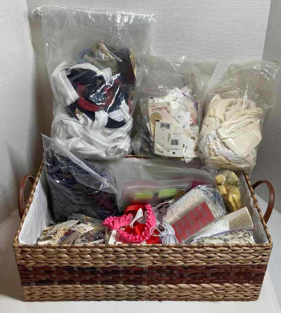 Photo 1 of FABRIC ZIPPERS, BUTTONS, REMNANTS & ACCESSORIES W WICKER BASKET 21” X 12” H7”