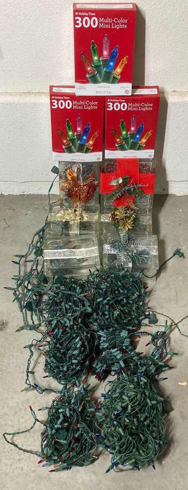 Photo 1 of CLEAR GLASS CHRISTMAS PRESENT LIGHTS W NEW & USED CHRISTMAS LIGHTS