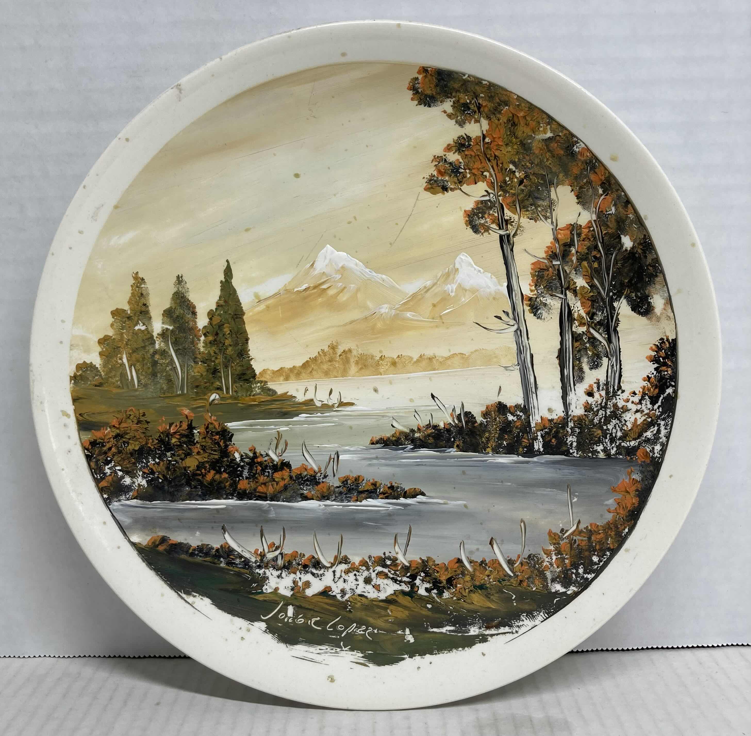 Photo 1 of MOUNTAIN LAKE CERAMIC PLATE HAND PAINTED SIGNED BY JORGE LOPEZ