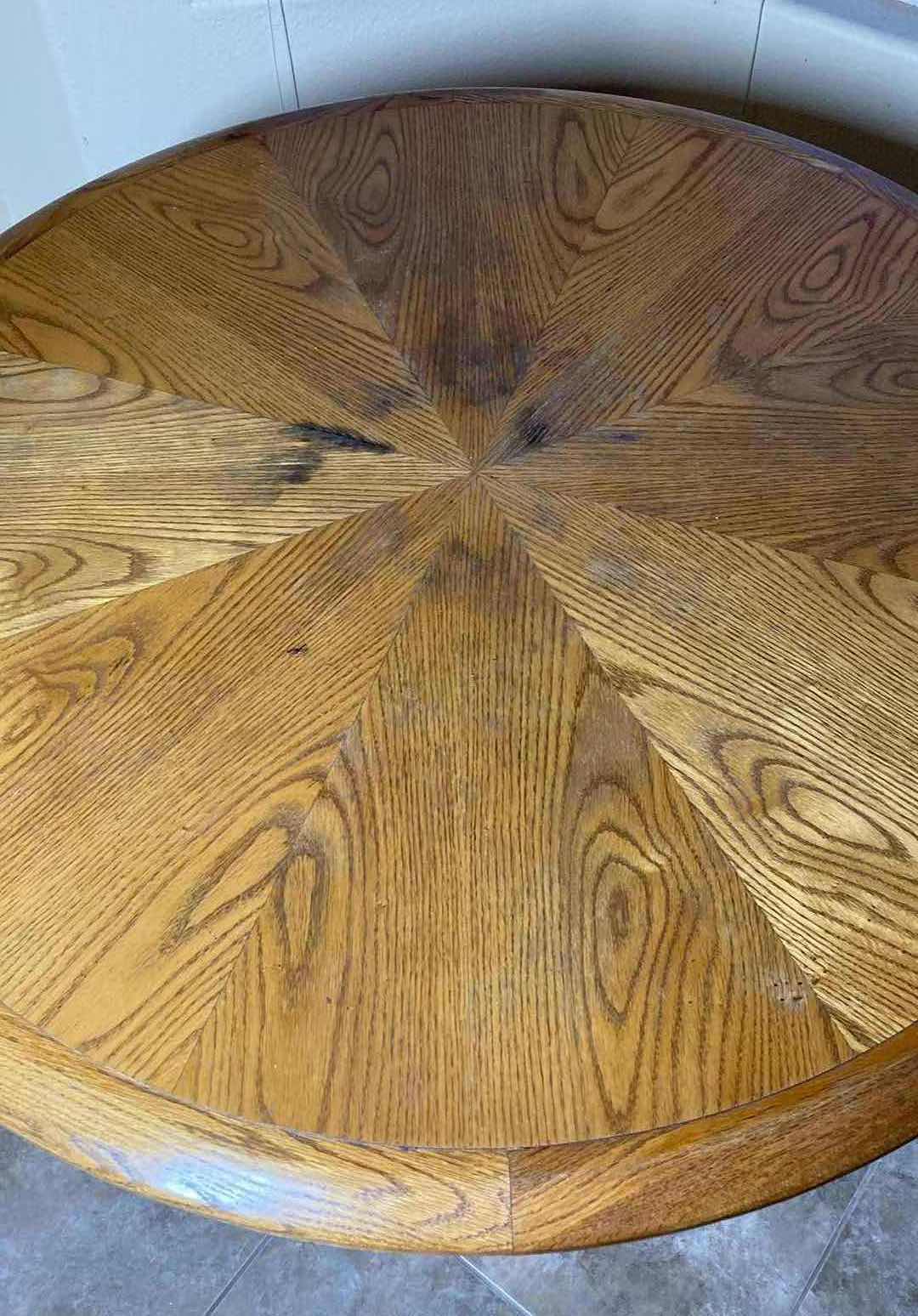 Photo 3 of VINTAGE ROUND OAK W METAL BASE DINING TABLE 48” X 29.5”