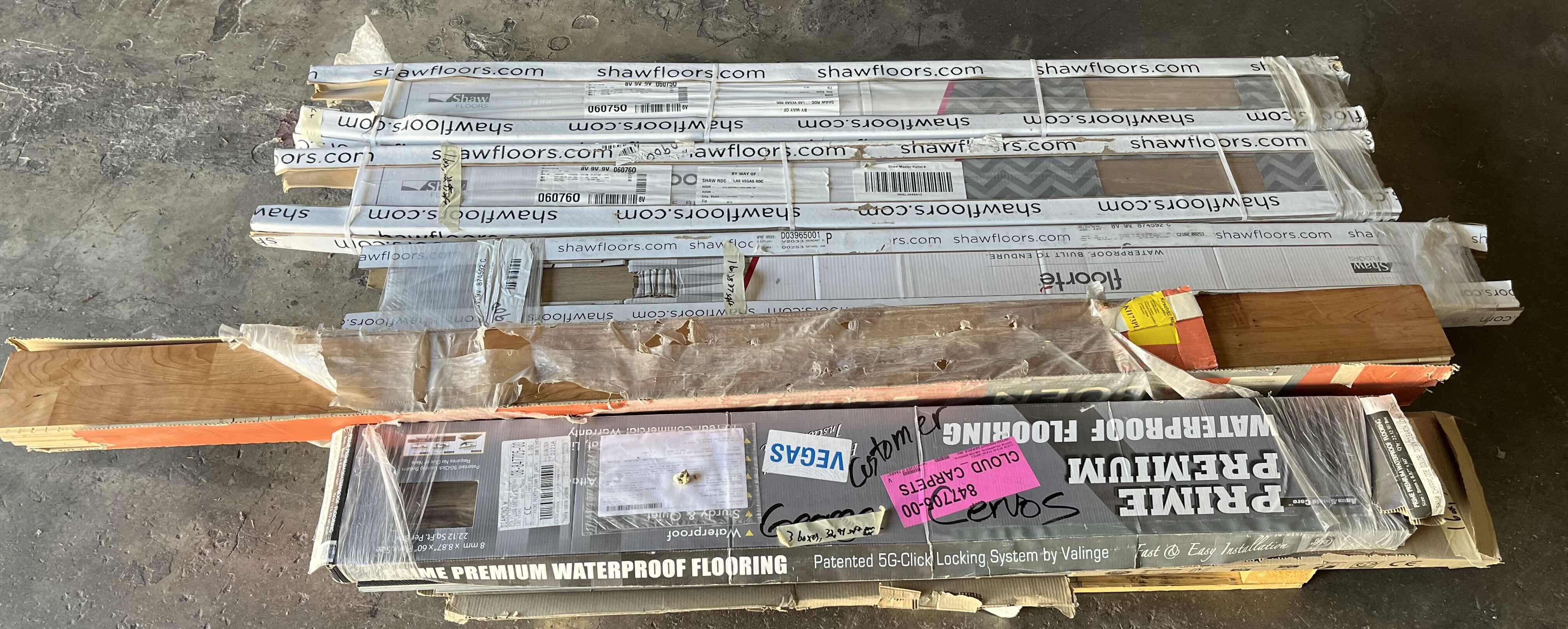 Photo 2 of MIXED FLOORING PALLET- VINYL & HARDWOOD PANEL FLOORING (7 BOXES)