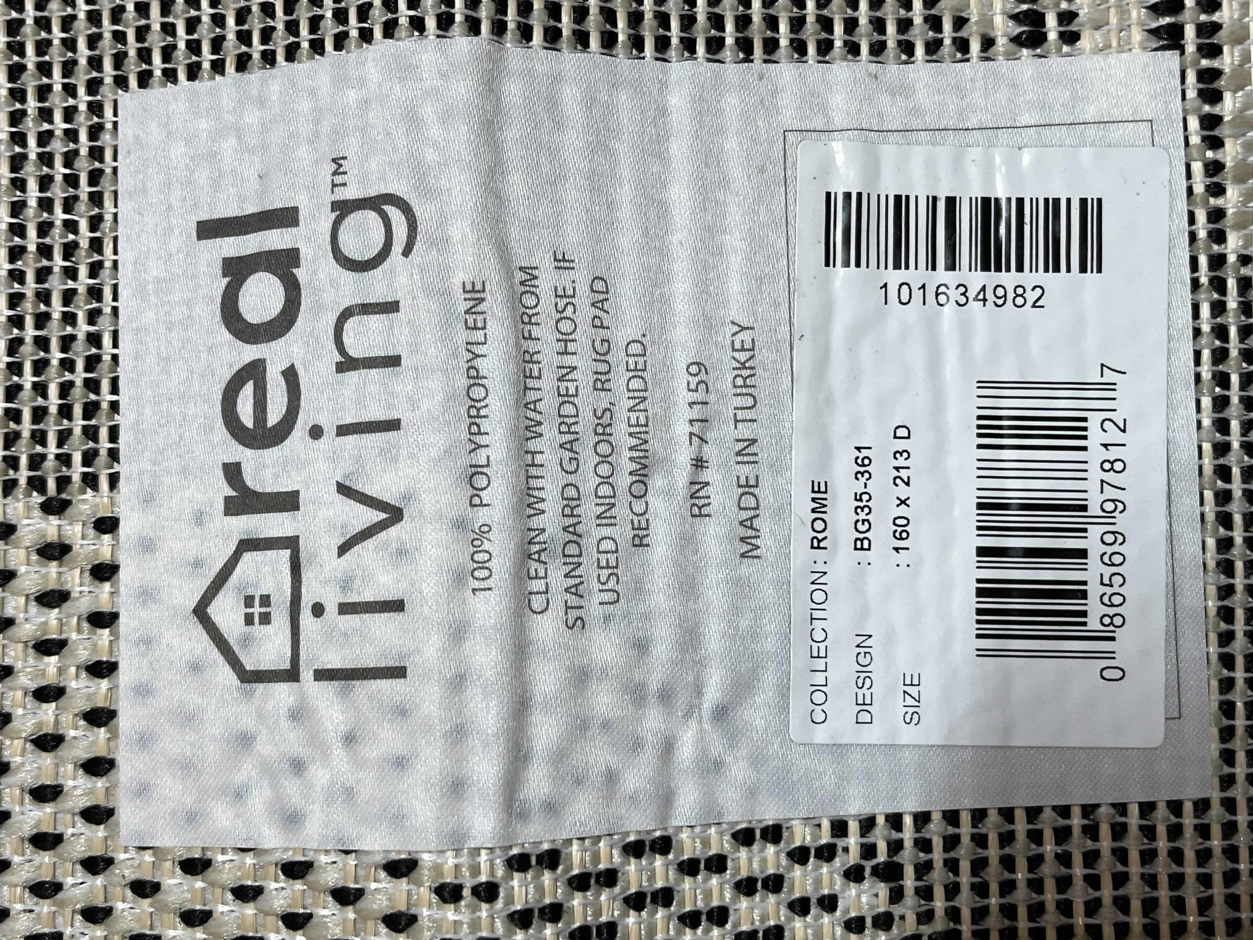 Photo 1 of REAL LIVING ROME COLLECTION BLACK & GREY GEOMETRIC PATTERN AREA RUG 5.3’ X 6.8’