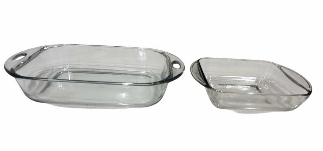 Photo 1 of ANCHOR HOCKING 10” X 13” RECTANGULAR 4 QT CLEAR BAKING DISH W HANDLES & AN 8” X 8” SQUARE 2 QT CLEAR BAKING DISH W HANDLES