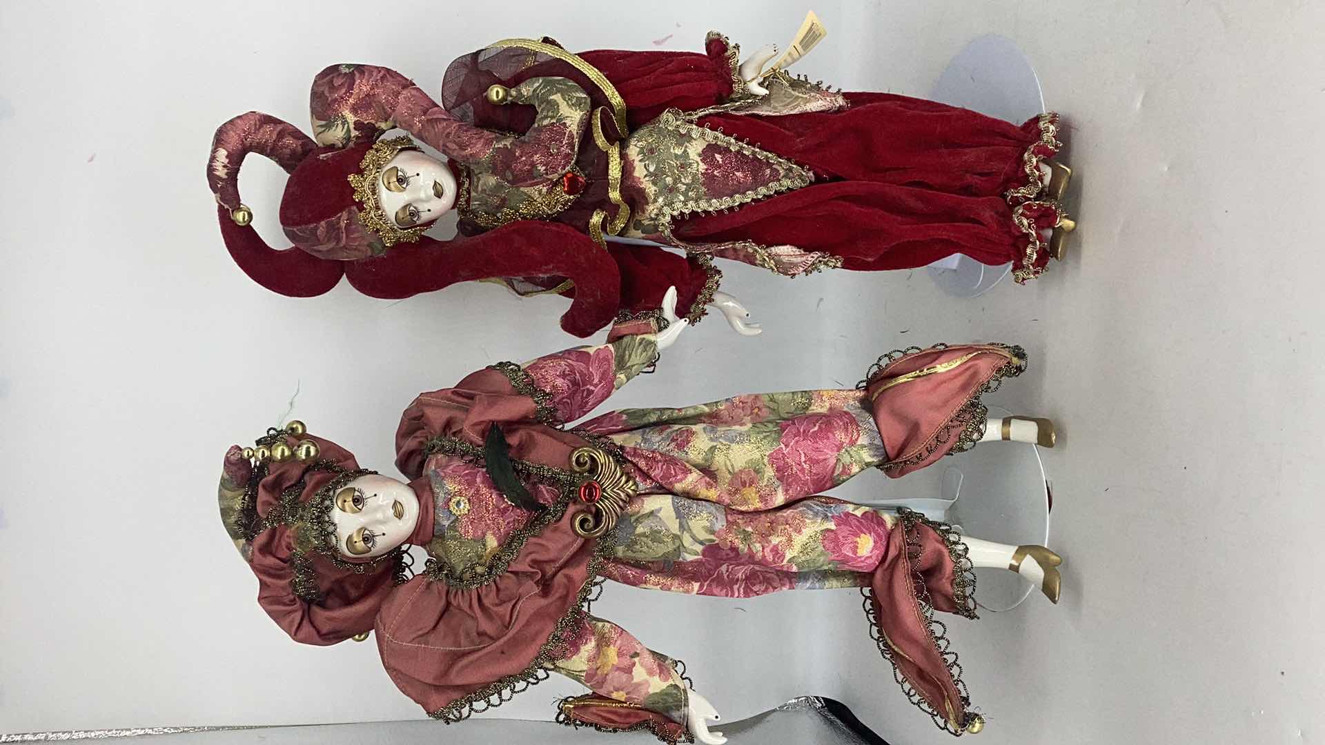 Photo 1 of TWO COLLECTIBLE PORCELAIN DOLLS H17”