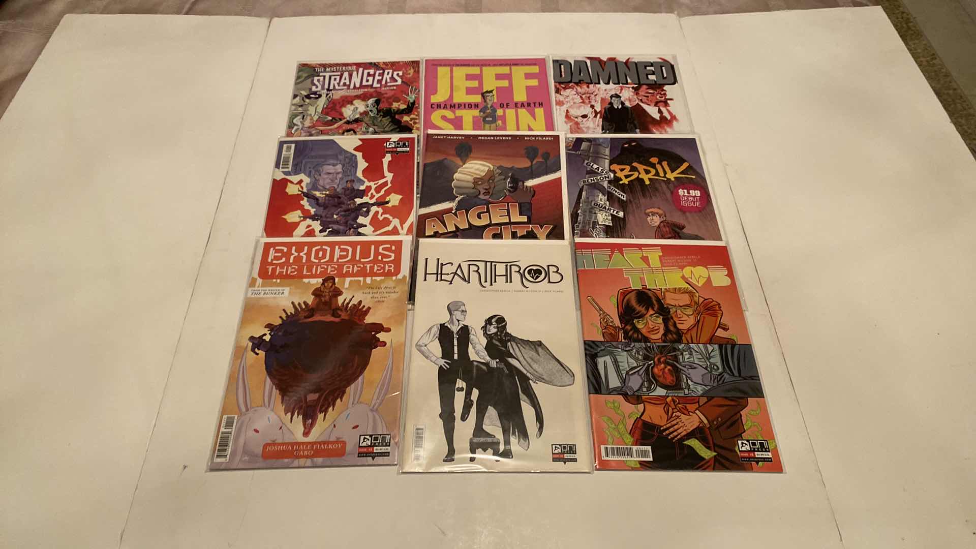 Photo 1 of 9-ONI PRESS ASSORTED COMICS