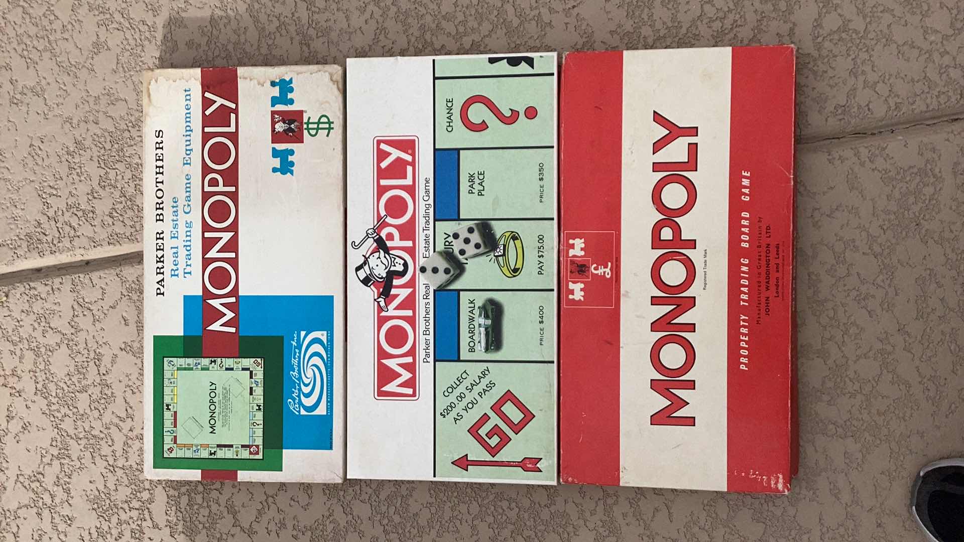 Photo 1 of RARE BRITISH 1961 MONOPOLY GAME AND LATER VERSIONS