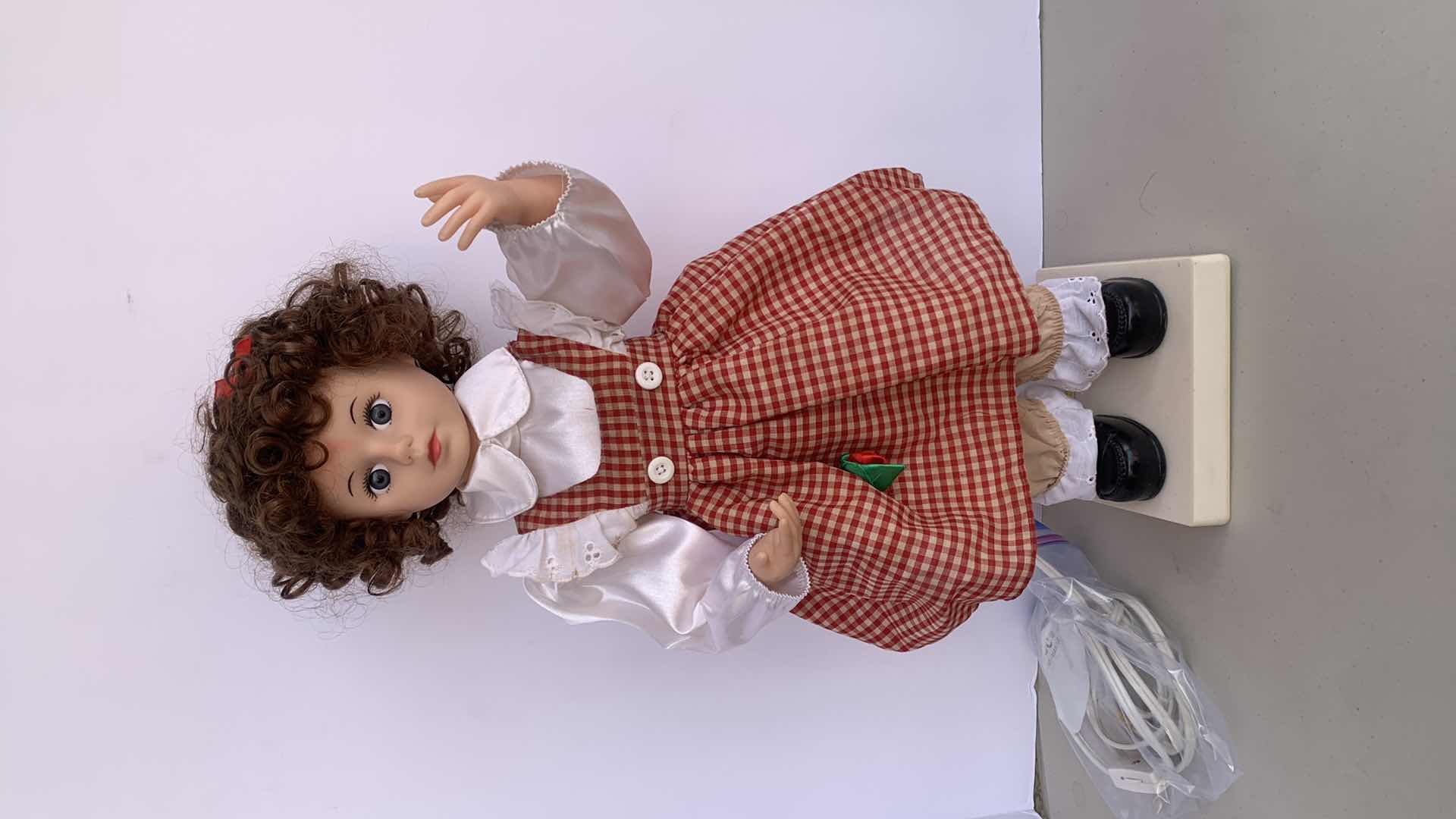 Photo 1 of VINTAGE LIGHT UP GIRL DOLL IN RED CHECK DRESS, LIGHT UP H 21 “