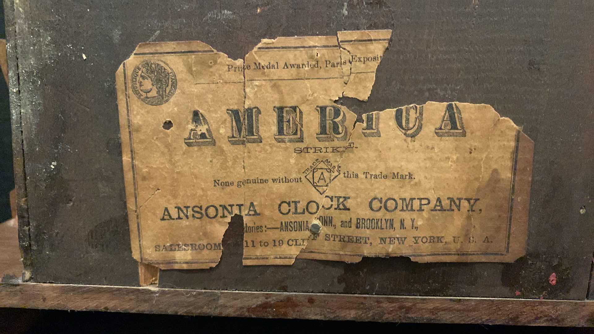 Photo 5 of AMERICA STRIKE WOOD CLOCK BY ANSONIA CLOCK COMPANY 12” x 21.5”