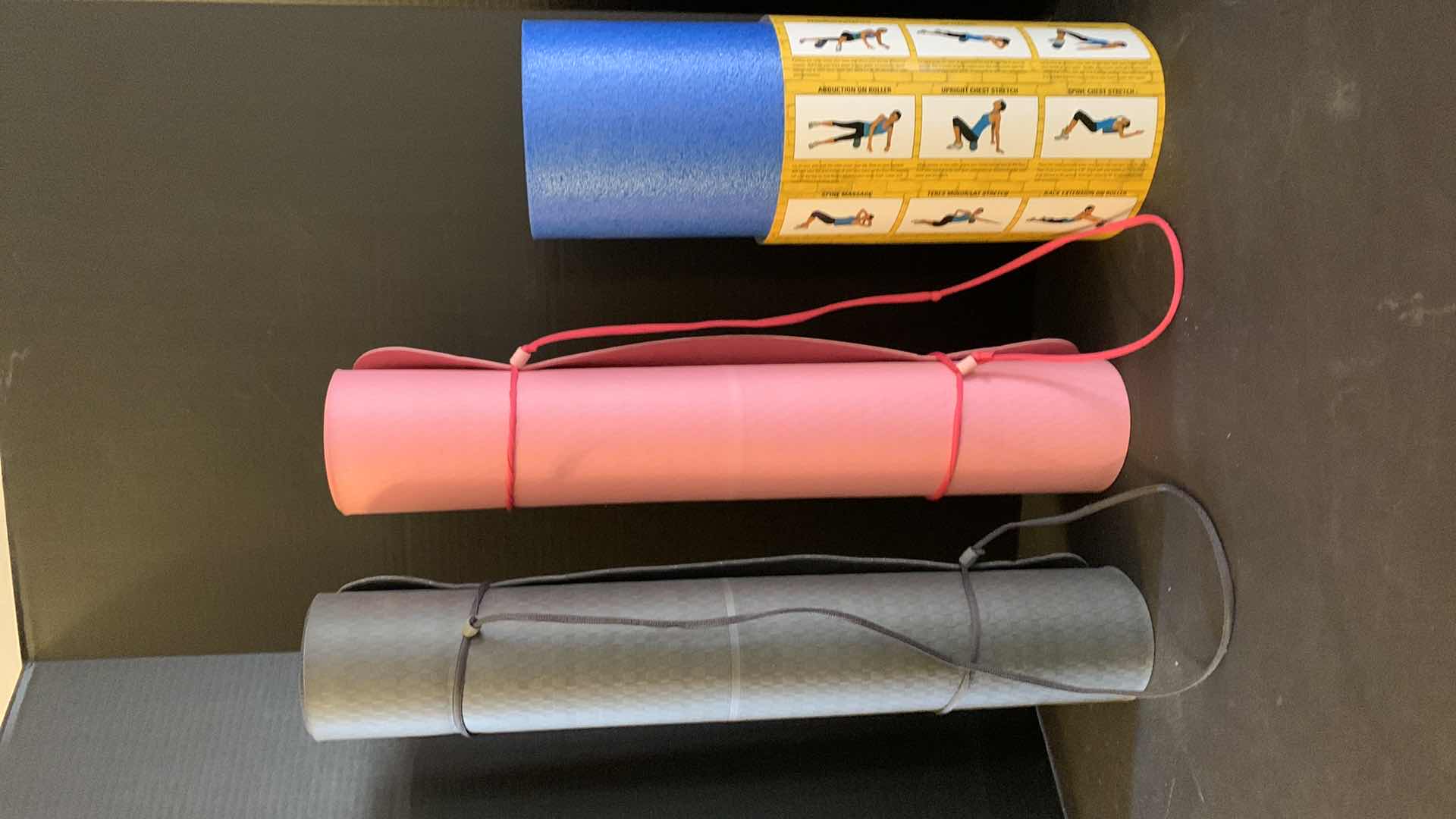 Photo 1 of TWO YOGA MATS AND A MASSAGE ROLLER