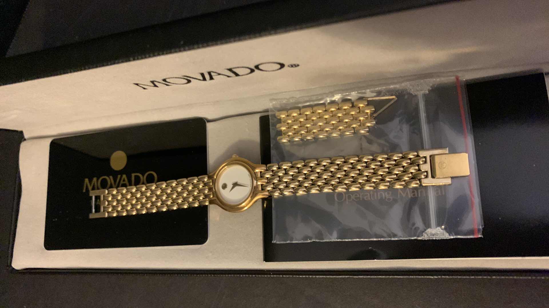 Photo 2 of WOMENS GOLD MOVADO WATCH W BOX, CASE, LINKS, AND RECEIPT $550 in 1990