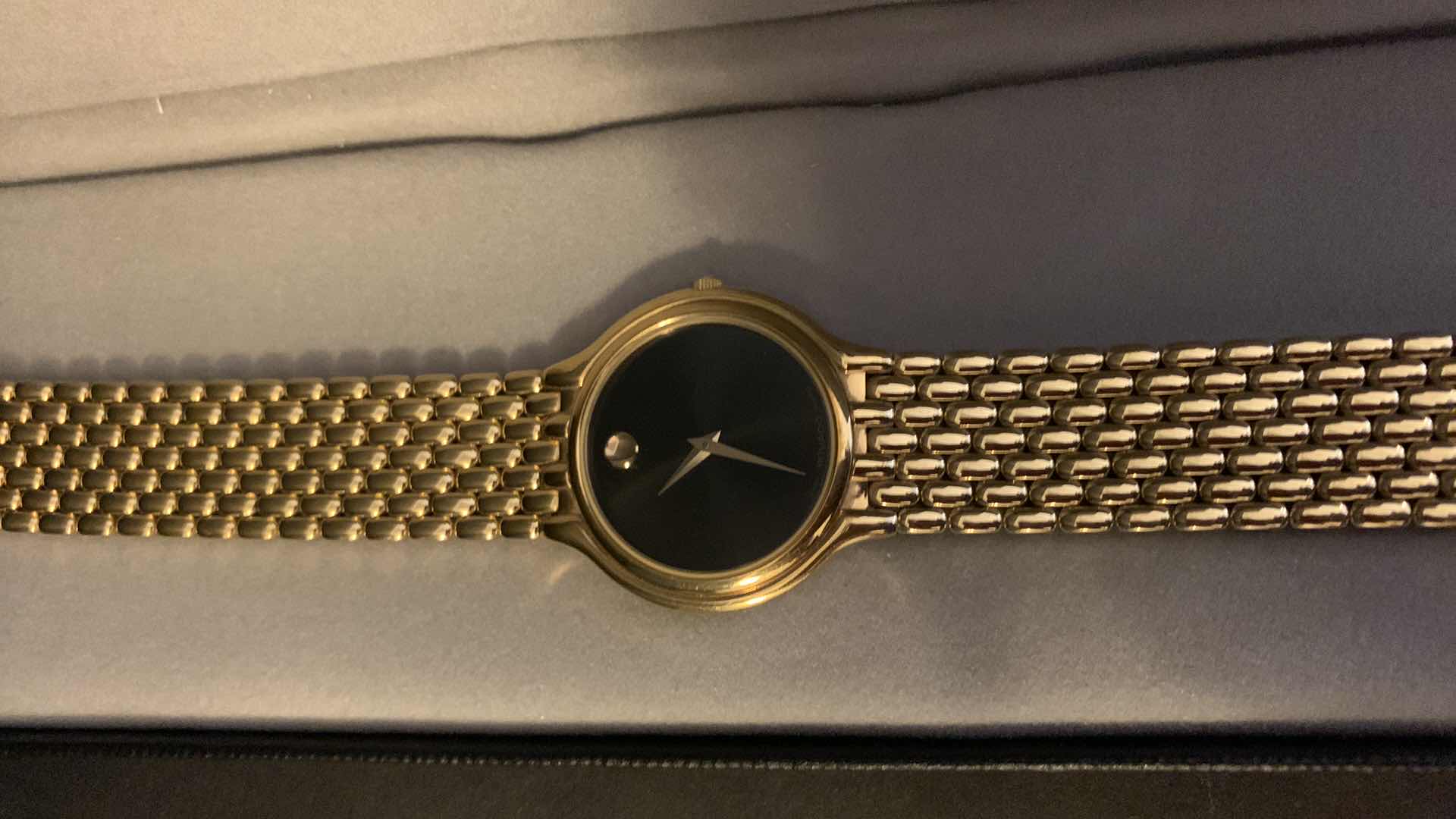 Photo 3 of MENS  GOLD MOVADO WATCH W BOX, CASE, LINKS, AND RECEIPT $650 in 1990