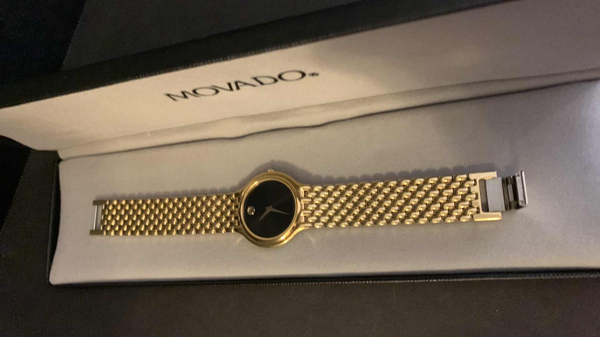 Photo 2 of MENS  GOLD MOVADO WATCH W BOX, CASE, LINKS, AND RECEIPT $650 in 1990