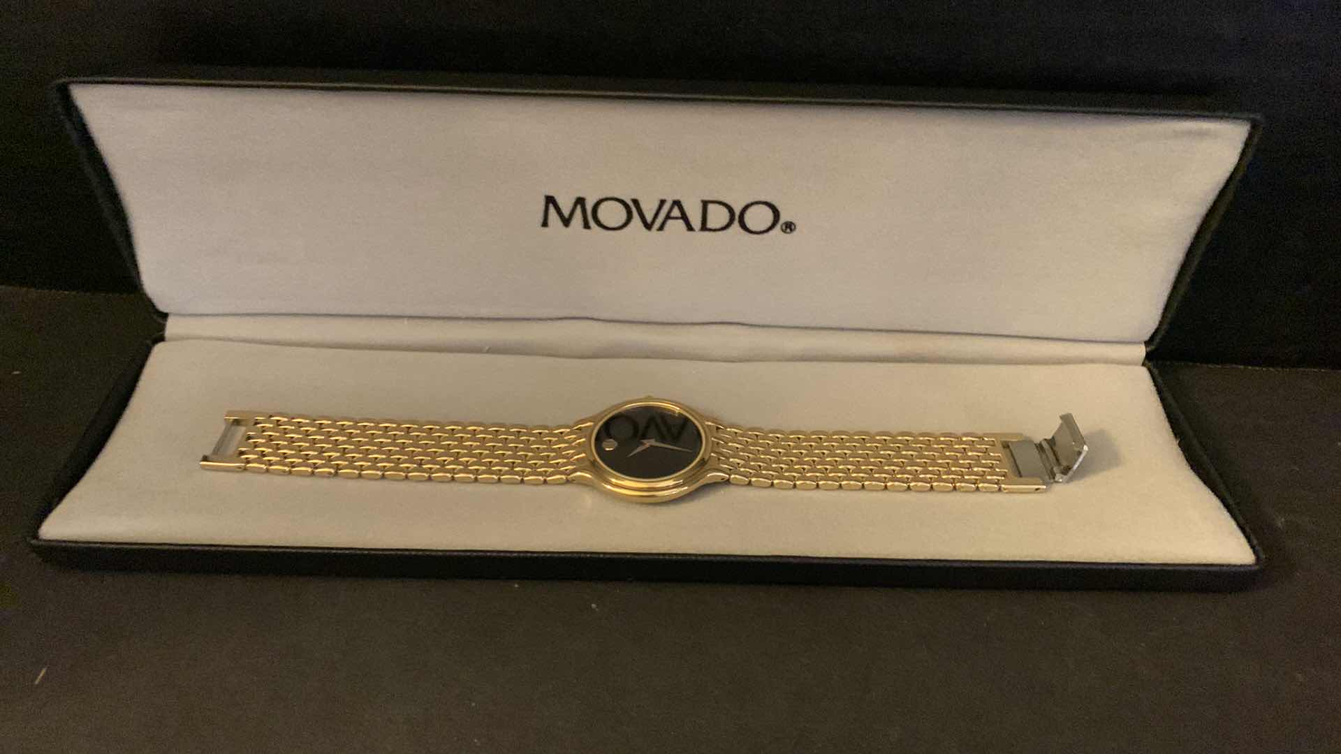 Photo 1 of MENS  GOLD MOVADO WATCH W BOX, CASE, LINKS, AND RECEIPT $650 in 1990