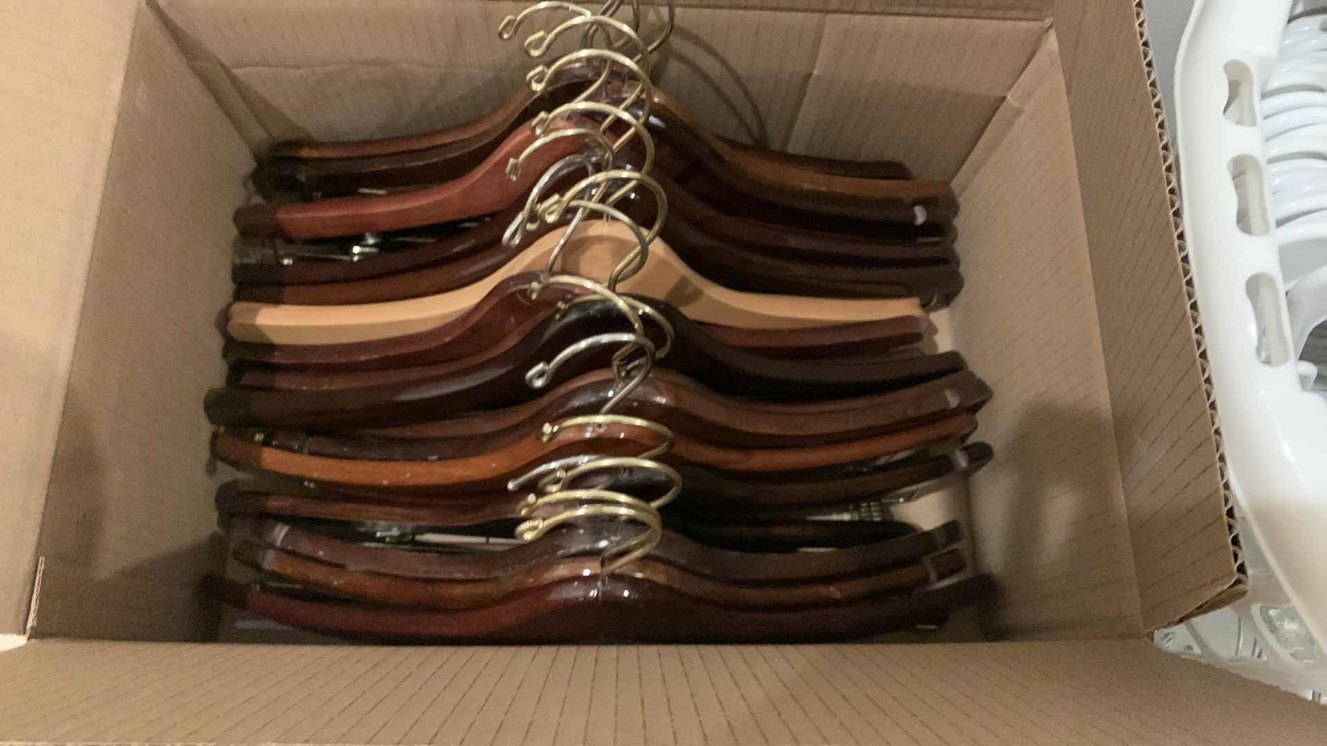 Photo 2 of THREE CONTAINERS OF HANGERS