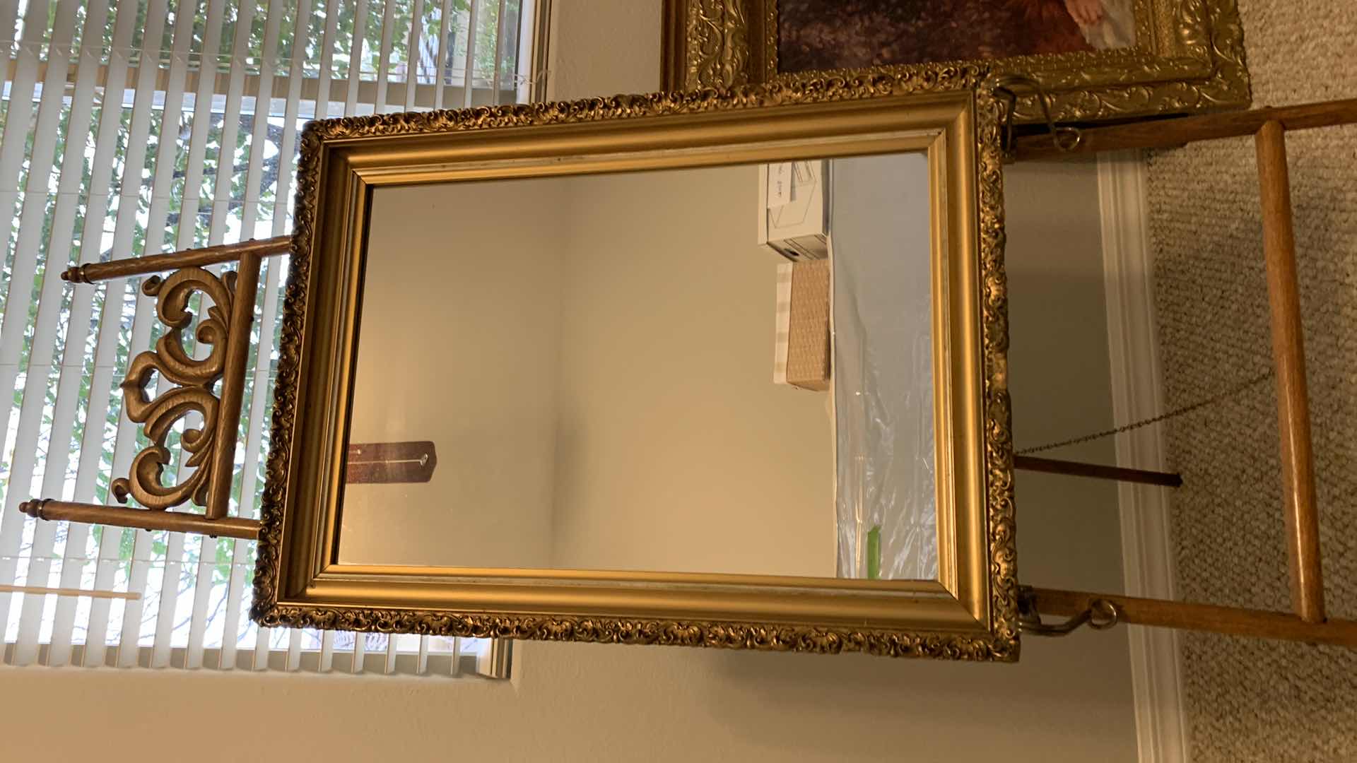 Photo 1 of VINTAGE MIRROR IN ORNATE GOLD FRAME 20.5” x 27.5” (stand not included)