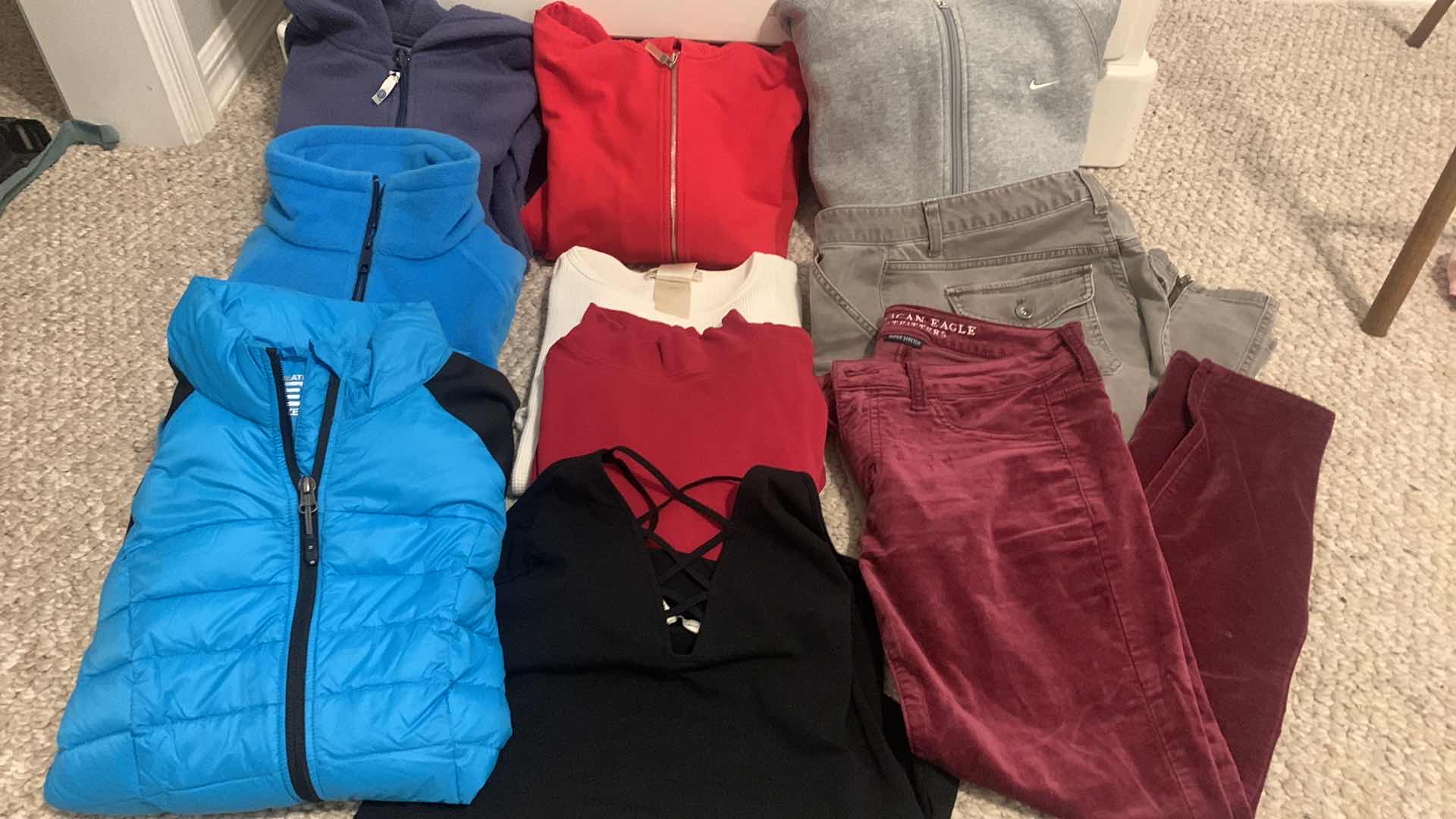 Photo 1 of WOMENS 10 PIECE CLOTHING ASSORTMENT (MOSTLY SIZE SMALL)