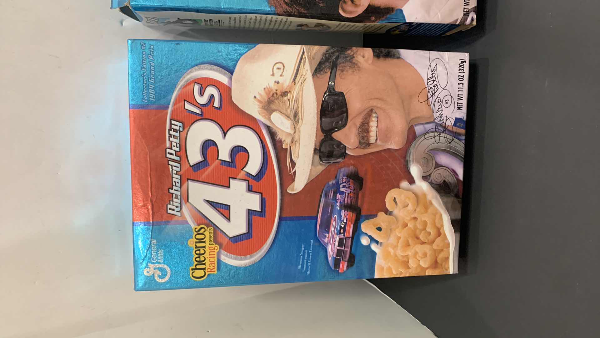 Photo 4 of 2 - VINTAGE CHEERIOS, RICHARD PETTY SIGNED, FULL SEALED CEREAL