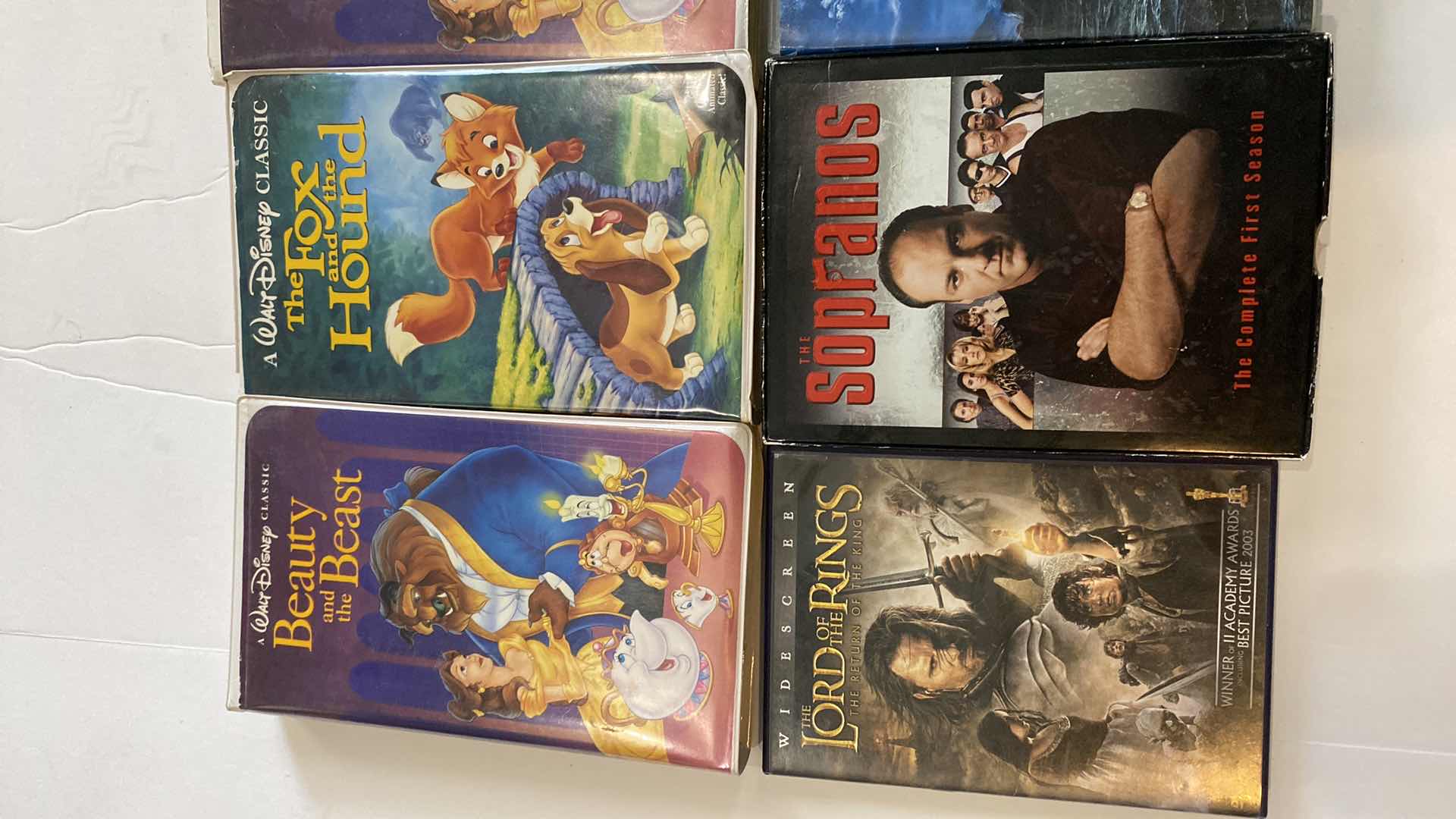 Photo 2 of 5 VHS MOVIES, 6 DVDS INCLUDING SOPRANOS FIRST SEASON AND US COINS BOOK