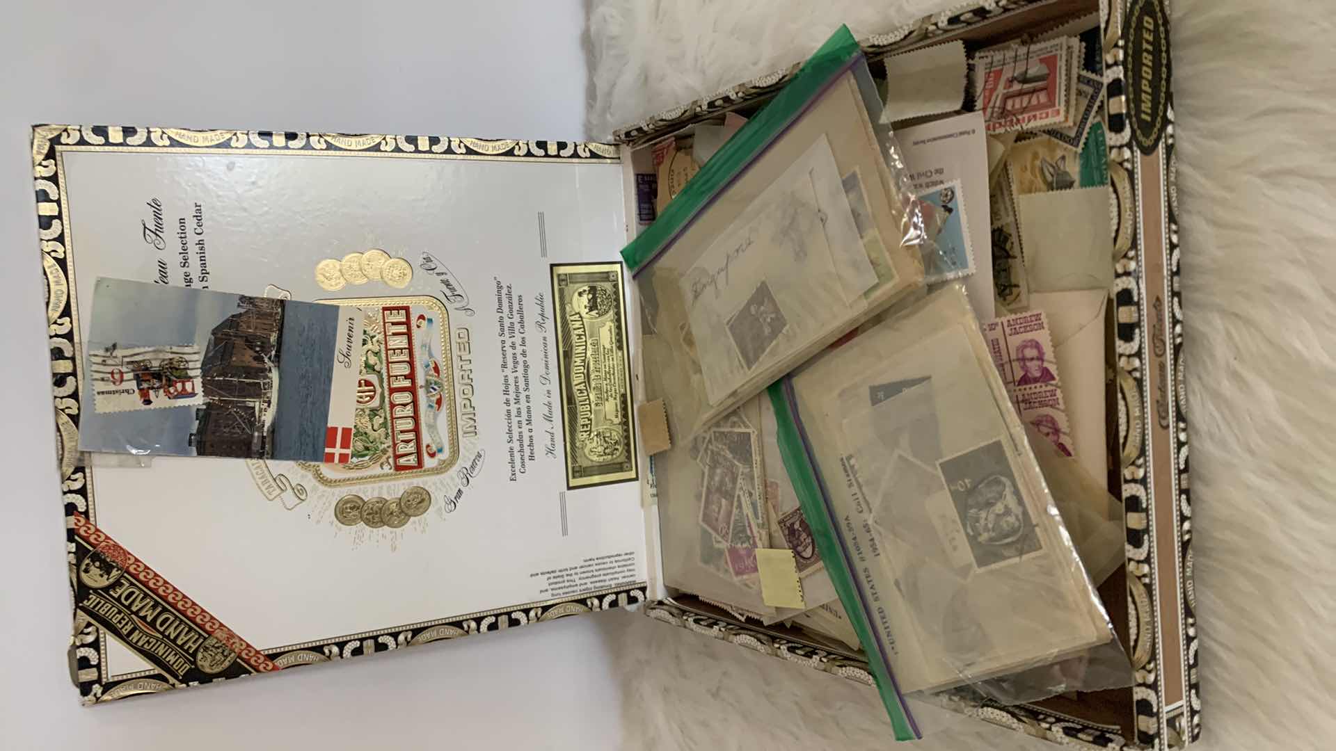 Photo 1 of STAMP COLLECTION IN CIGAR BOX