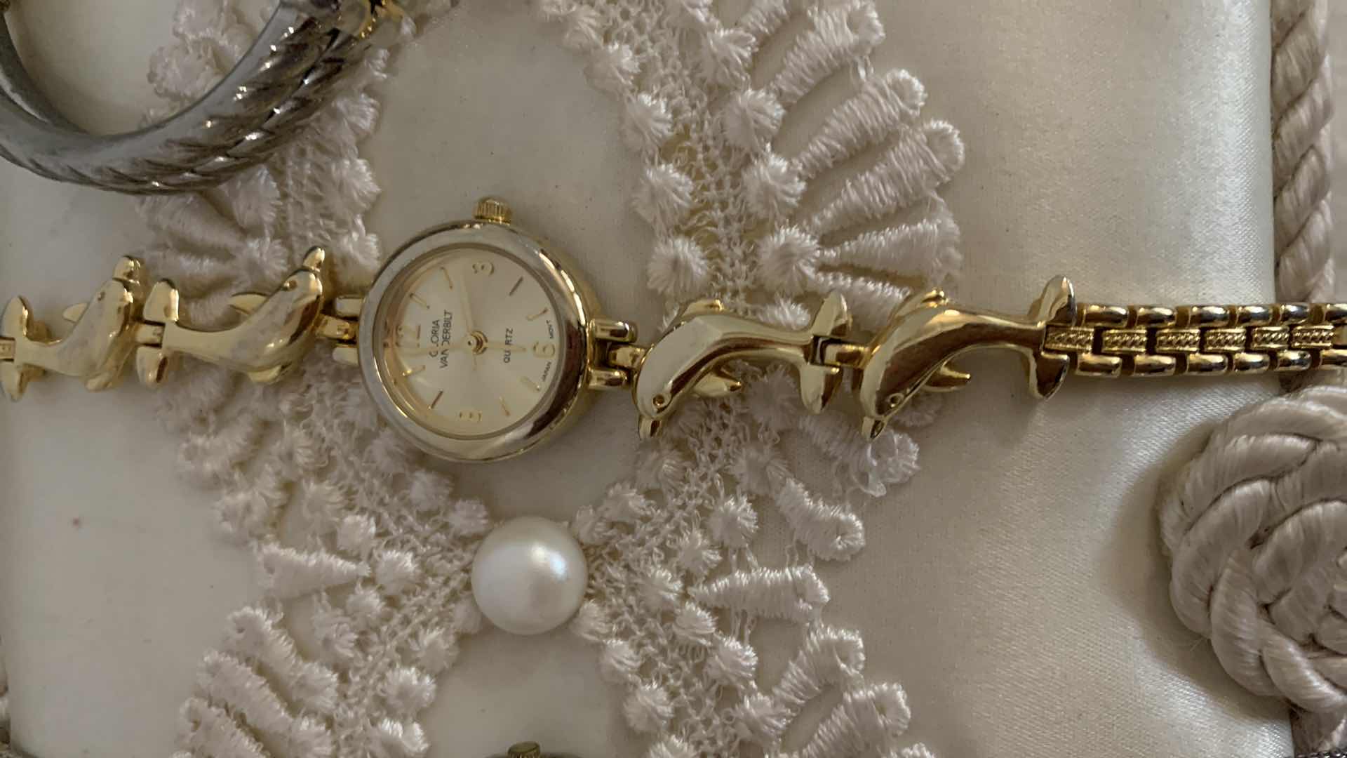 Photo 3 of IVORY SATIN BOX AND 4 LADIES WATCHES