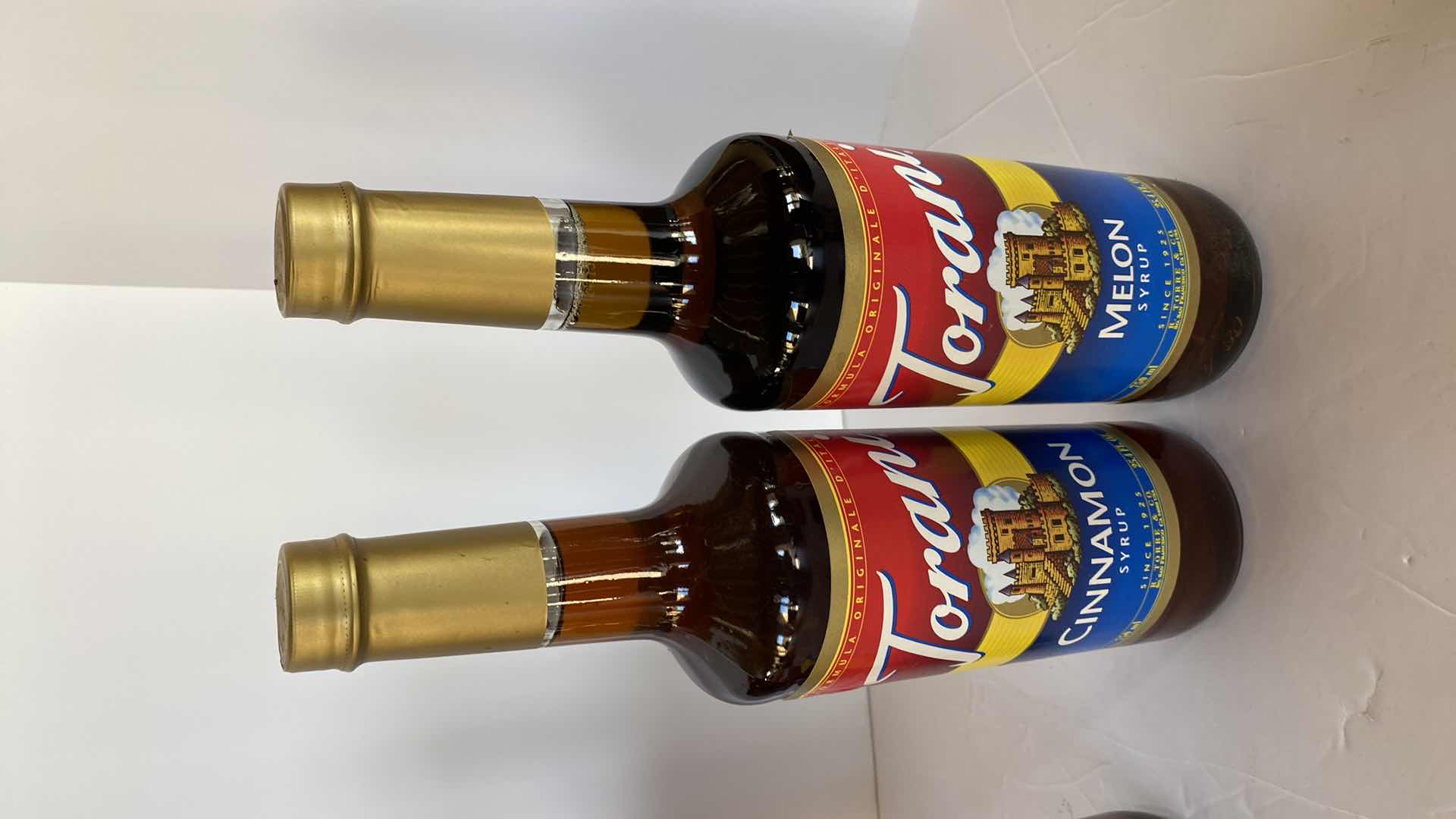 Photo 3 of TORANI CHOCOLATE SAUCE AND 4 SYRUPS UNKNOWN EXPIRATION DATES