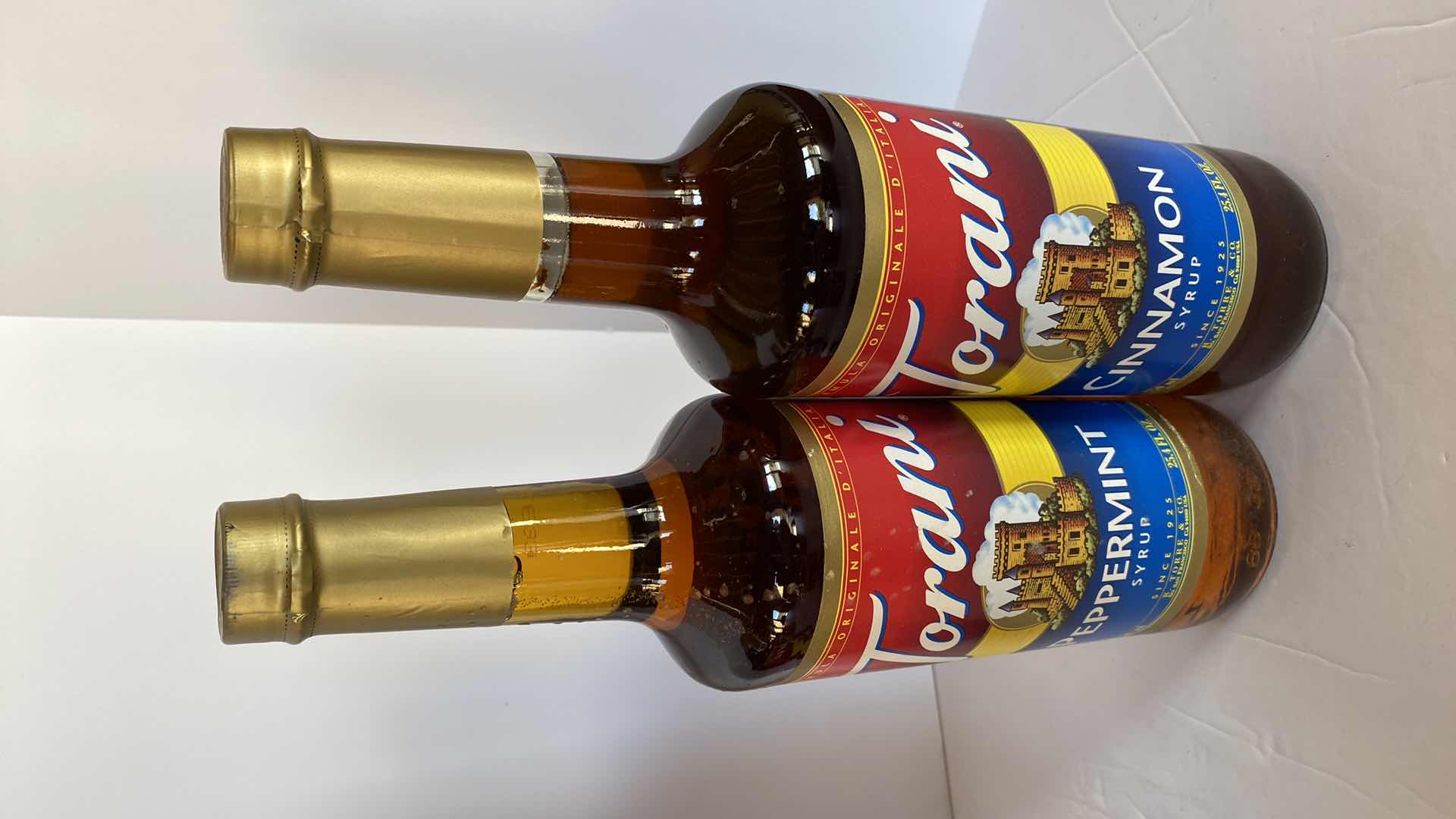 Photo 3 of TORANI CHOCOLATE SAUCE AND 4 SYRUPS UNKNOWN EXPIRATION DATES, INCLUDES TOTE