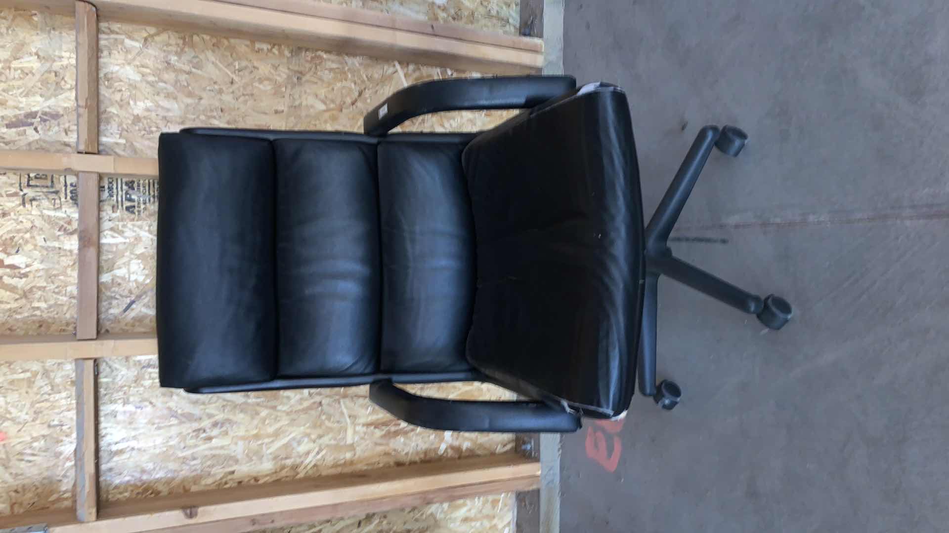 Photo 1 of BLACK BONDED LEATHER OFFICE CHAIR ON WHEELS