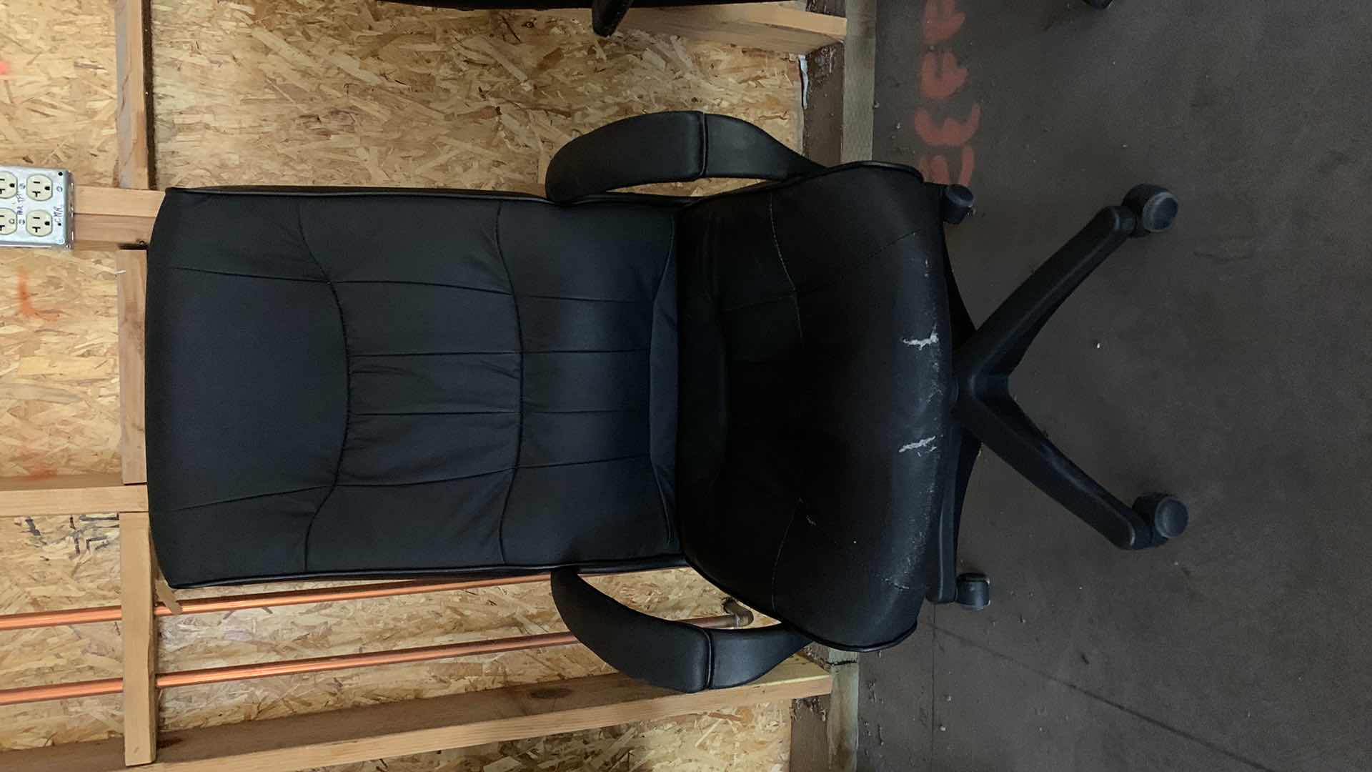 Photo 1 of BLACK BONDED LEATHER OFFICE CHAIR ON WHEELS