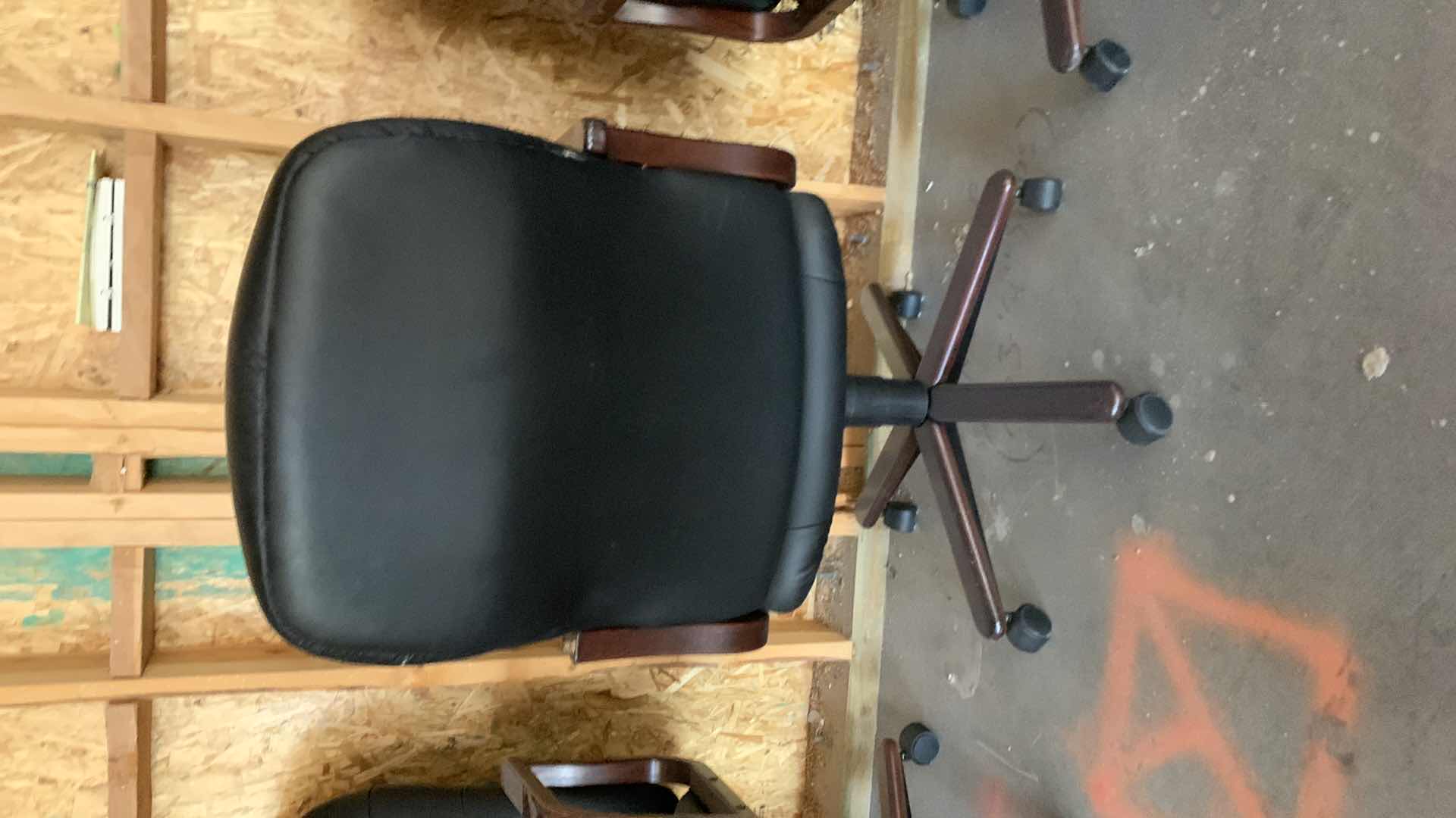 Photo 3 of BLACK WOOD AND BONDED LEATHER OFFICE CHAIR ON WHEELS