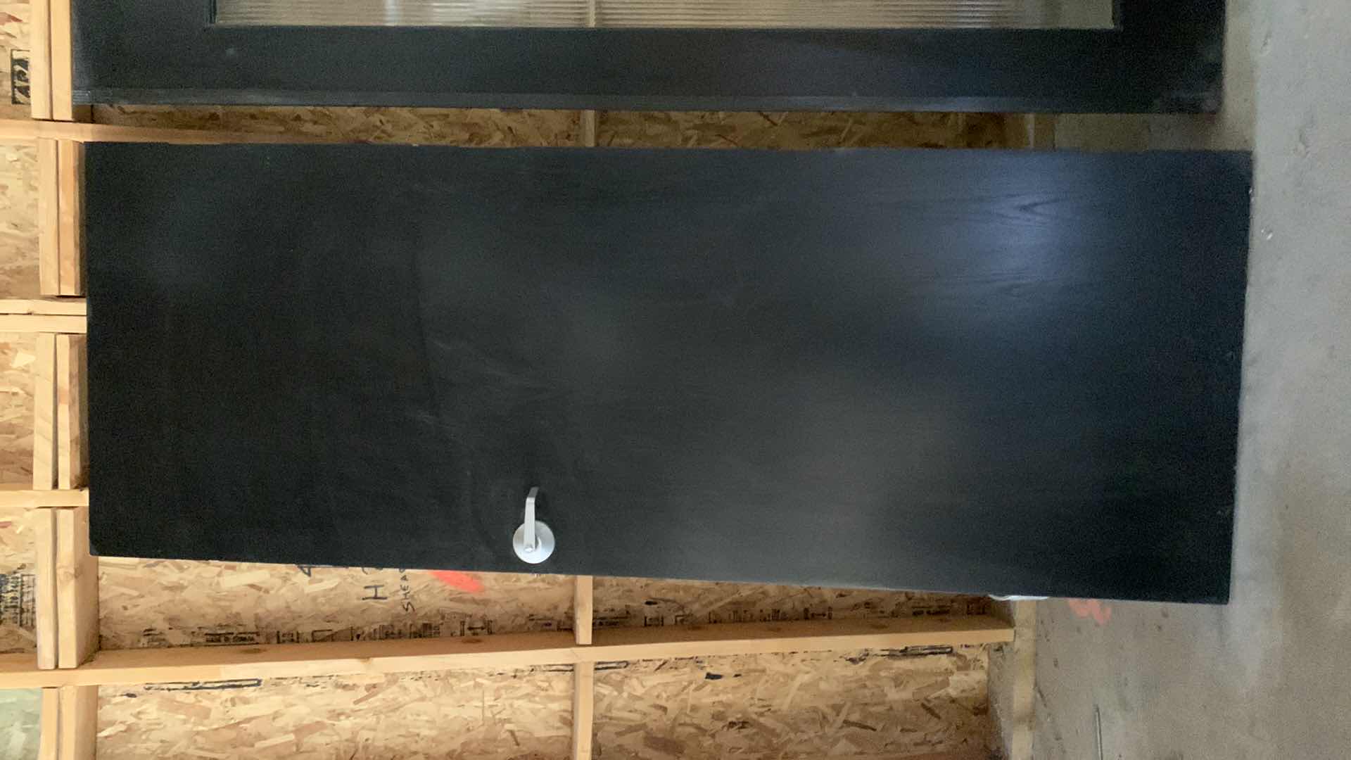 Photo 1 of BLACK WOOD GRAINED DOOR 
8'x3'
