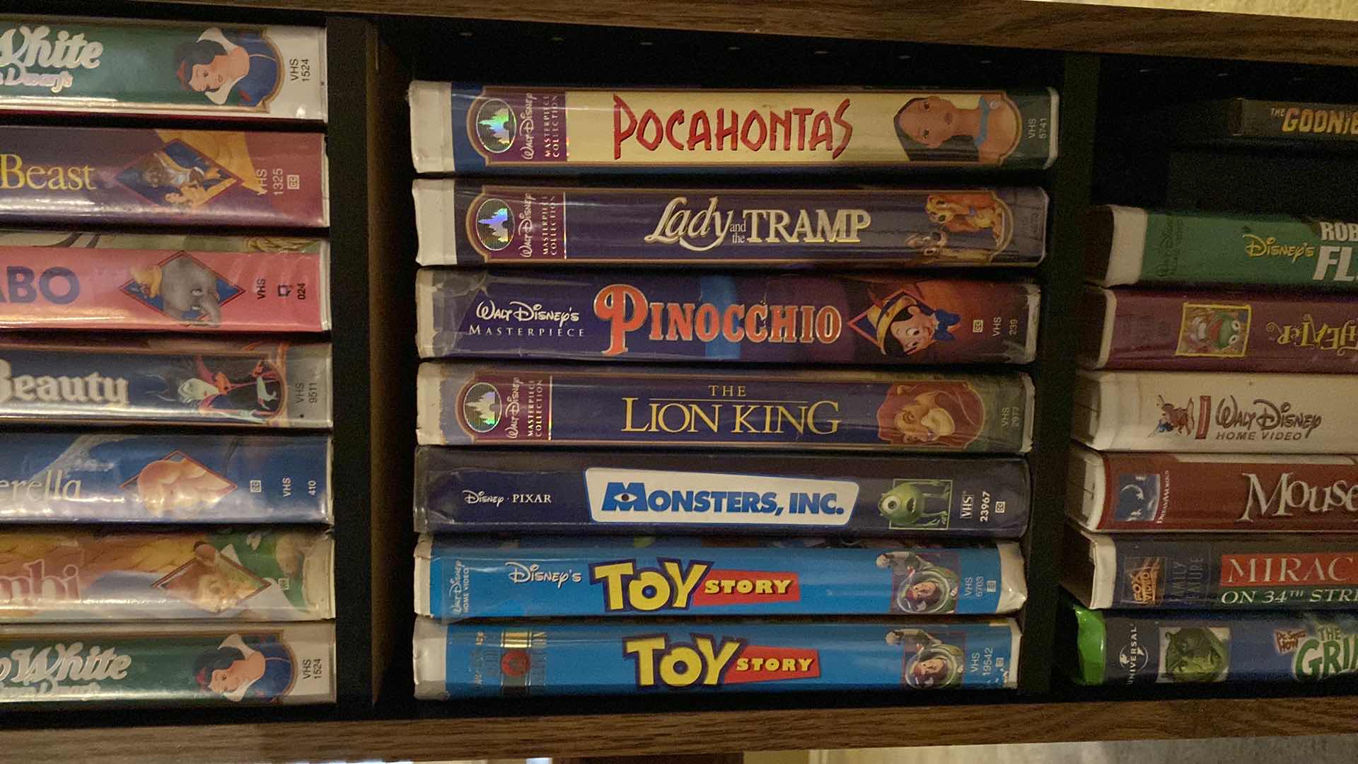 Photo 3 of DISNEY VHS COLLECTION INCLUDES HOLDER 11" X 9" H45"