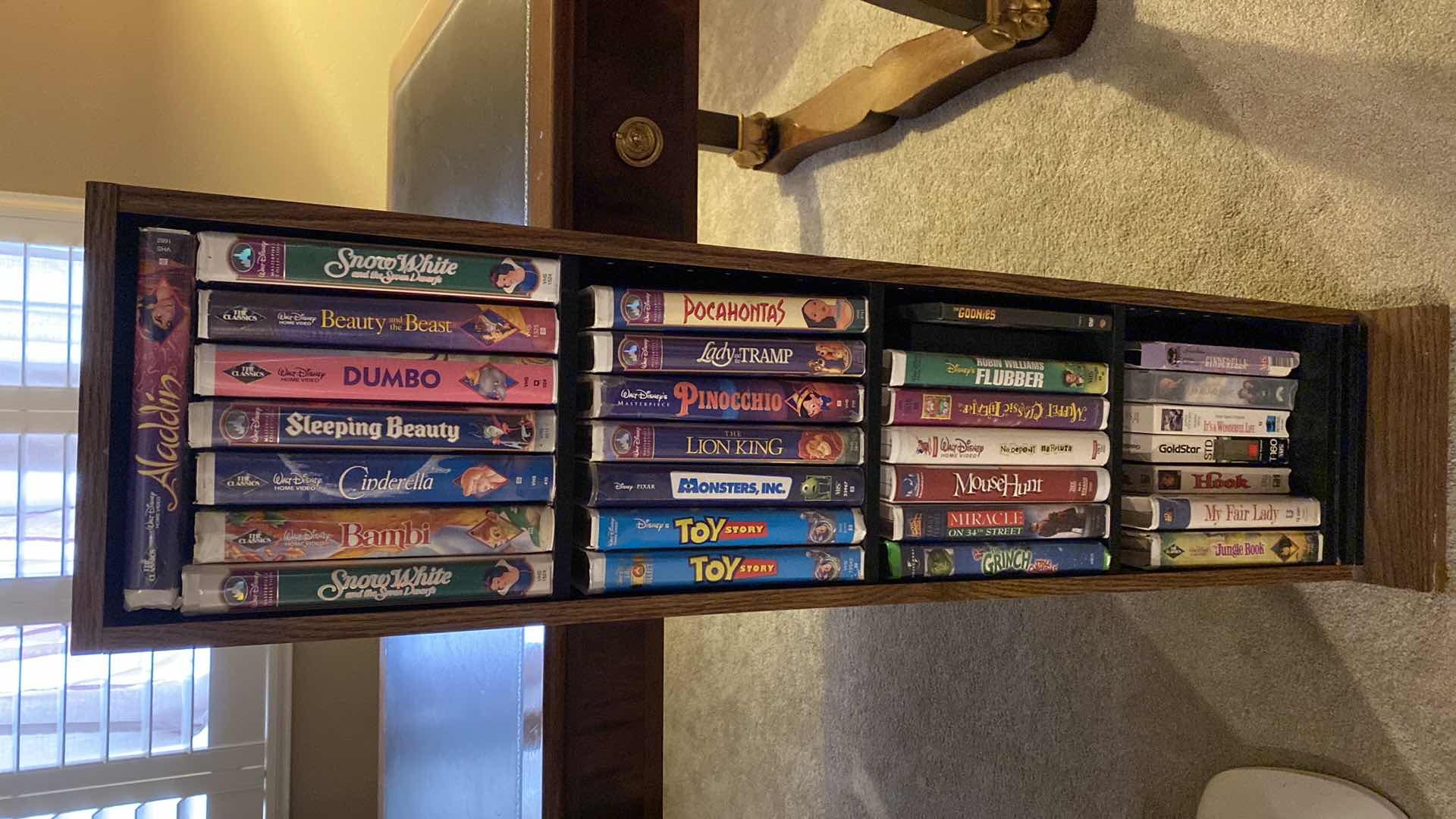 Photo 1 of DISNEY VHS COLLECTION INCLUDES HOLDER 11" X 9" H45"