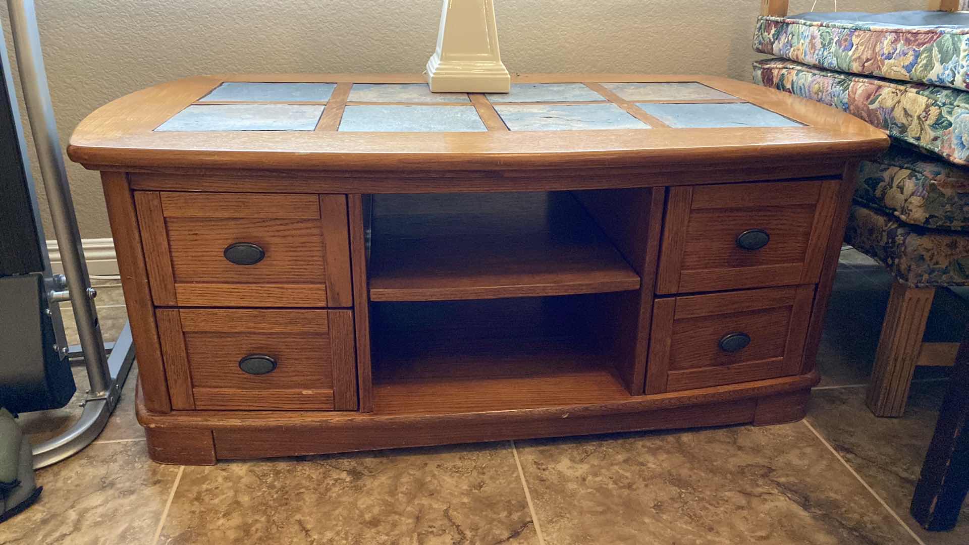 Photo 1 of WOOD COFFEE TABLE WITH SLATE INLAY TOP WITH 4 DRAWERS 48" X 28" H19" (LAMP NOT INCLUDED)