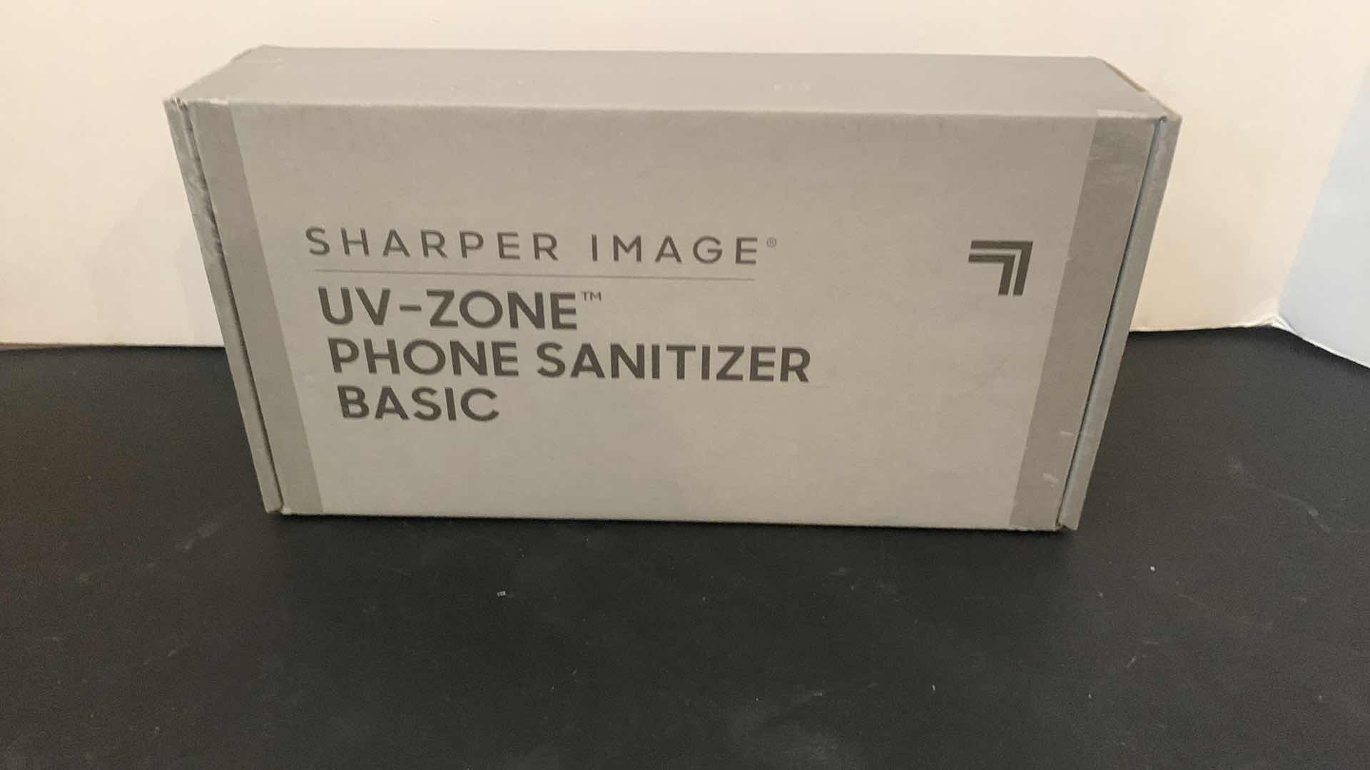 Photo 1 of NEW IN BOX SHARPER IMAGE UV-ZONE PHONE SANITIZER