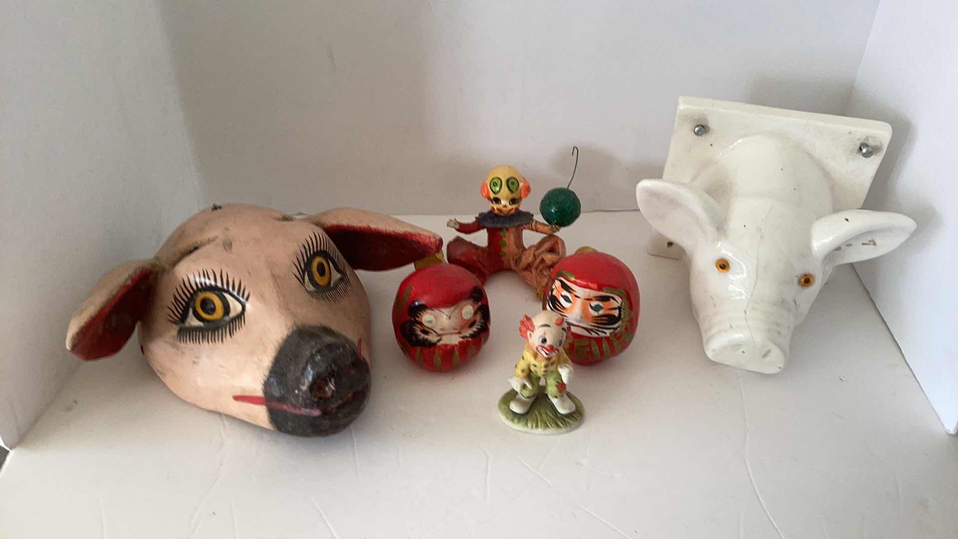 Photo 1 of ASSORTED PIG, DAHRUMA AND CLOWN STATUES