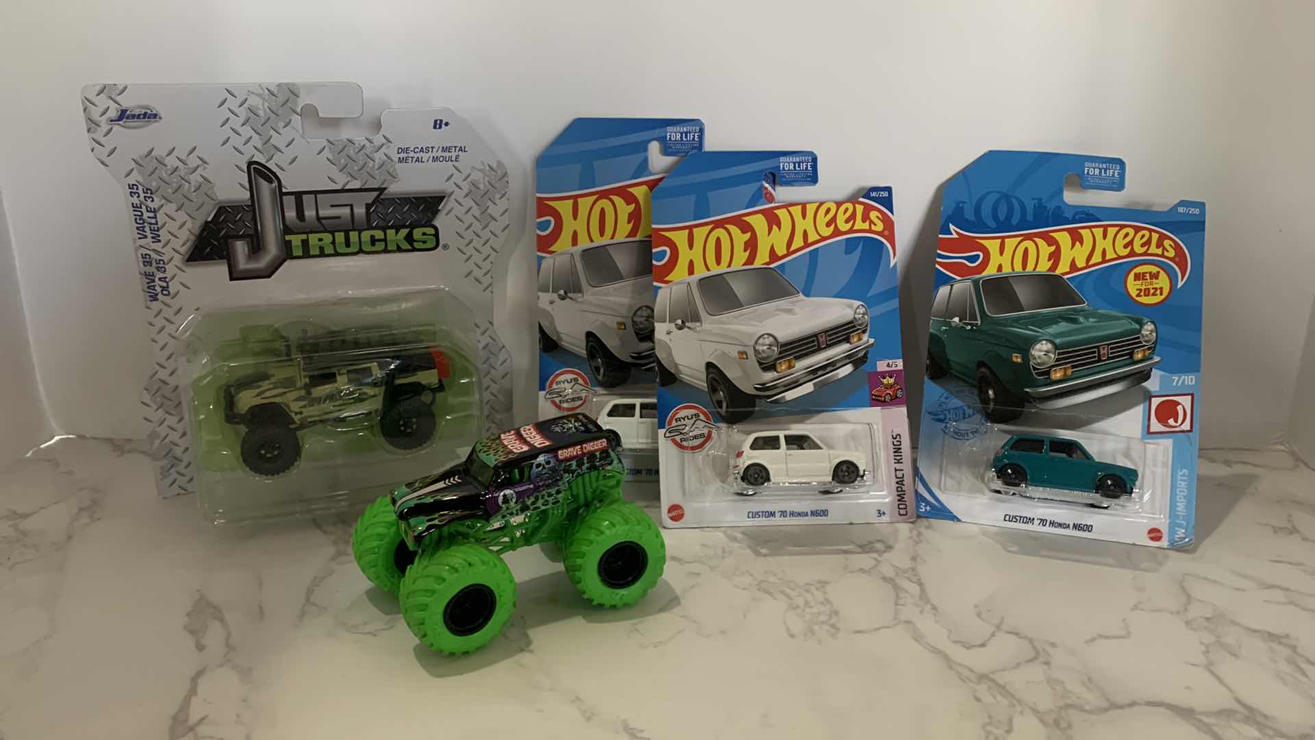 Photo 1 of COLLECTIBLE HOT WHEELS AND JUST TRUCKS
