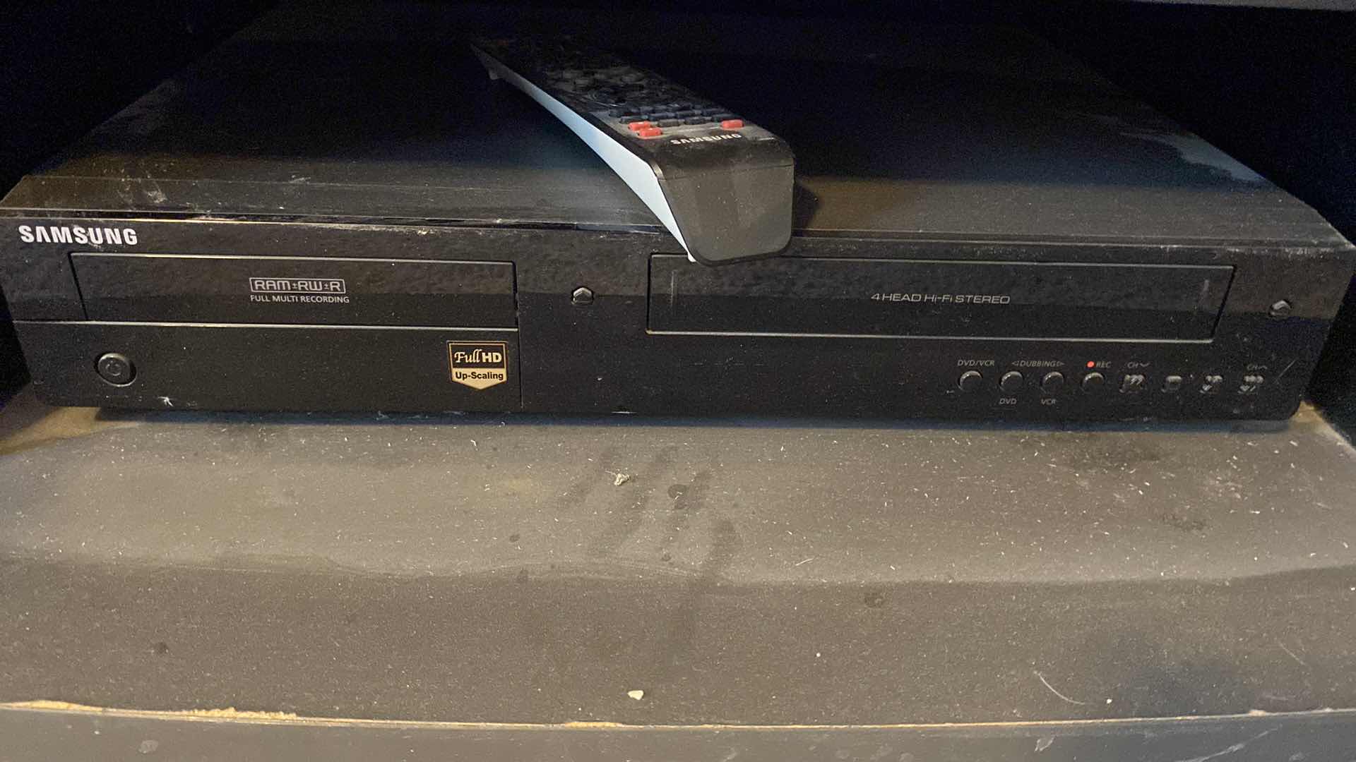 Photo 9 of HAIER 31” TV WITH REMOTE. TV STAND WITH SAMSUNG DVD VHS TAPE PLAYER WITH REMOTE 31” X 20” H15”