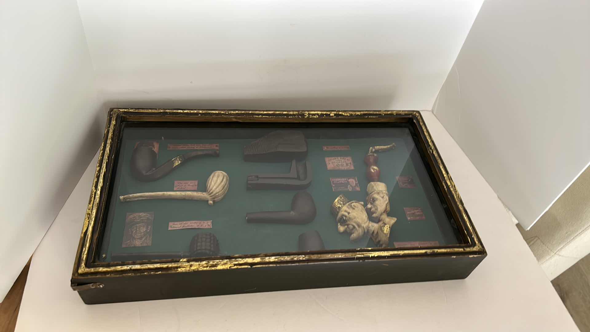 Photo 9 of DISTRESSED BLACK AND GOLD FRAMED SHADOW BOX WITH VINTAGE PIPES 20.5” x 11.25”