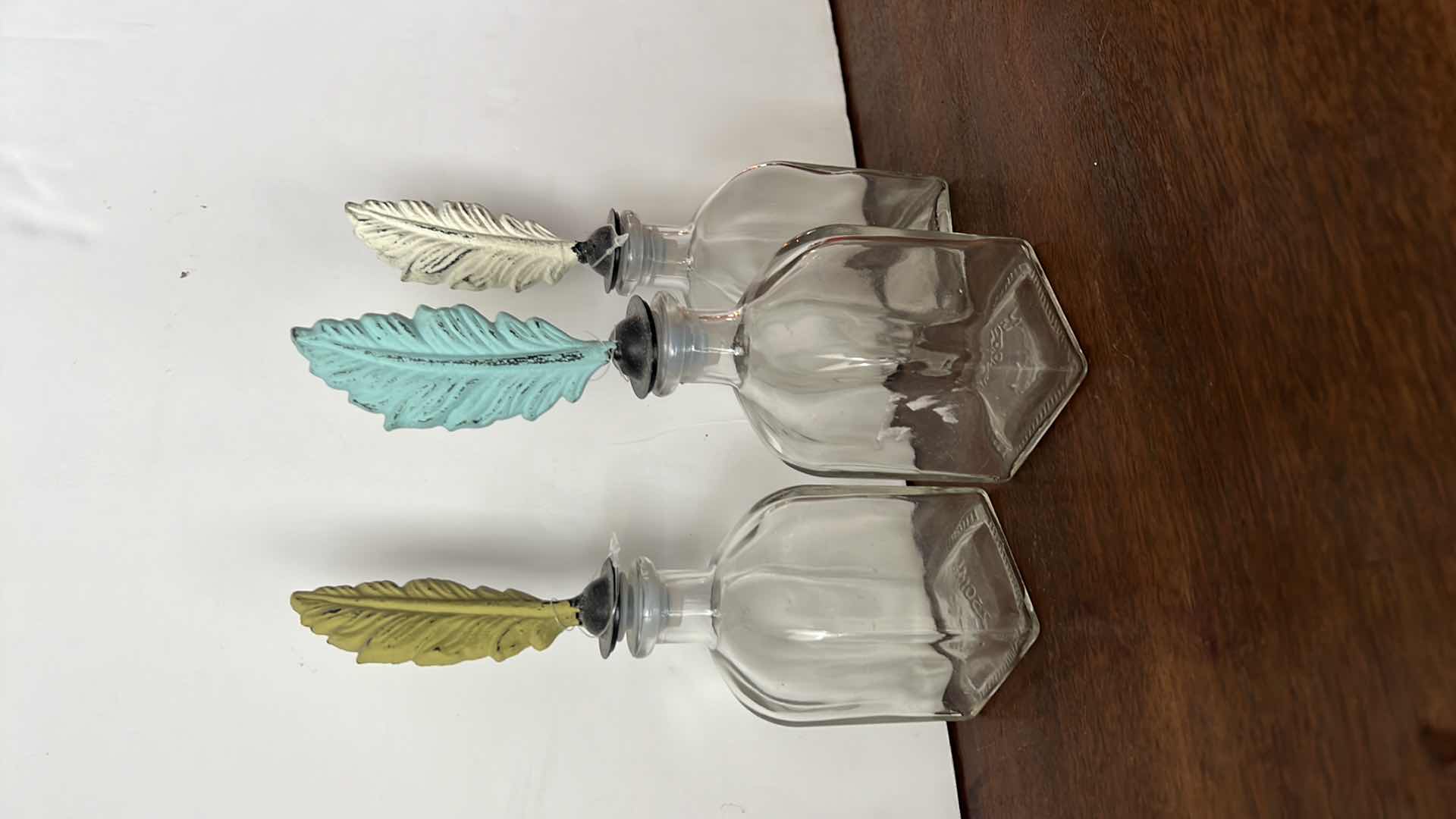 Photo 3 of 3-FEATHER GLASS DECORATIVE BOTTLES
