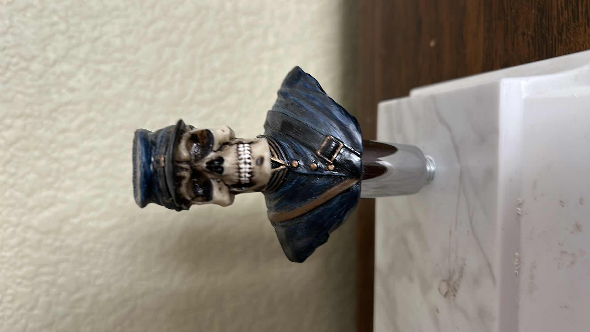 Photo 2 of HOME DECOR - MILITARY SKULLS ON STAND ( STAND WITH SKULLS MEASURES 7” x 4” x 4 1/2”