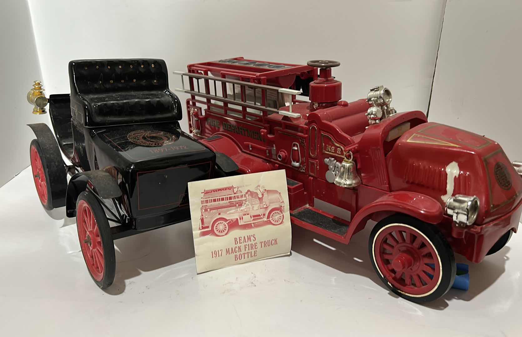 Photo 1 of COLLECTIBLE LIQUOR BOTTLES FIRE TRUCK MEASURES 17“ x 6 1/2“ x 7“