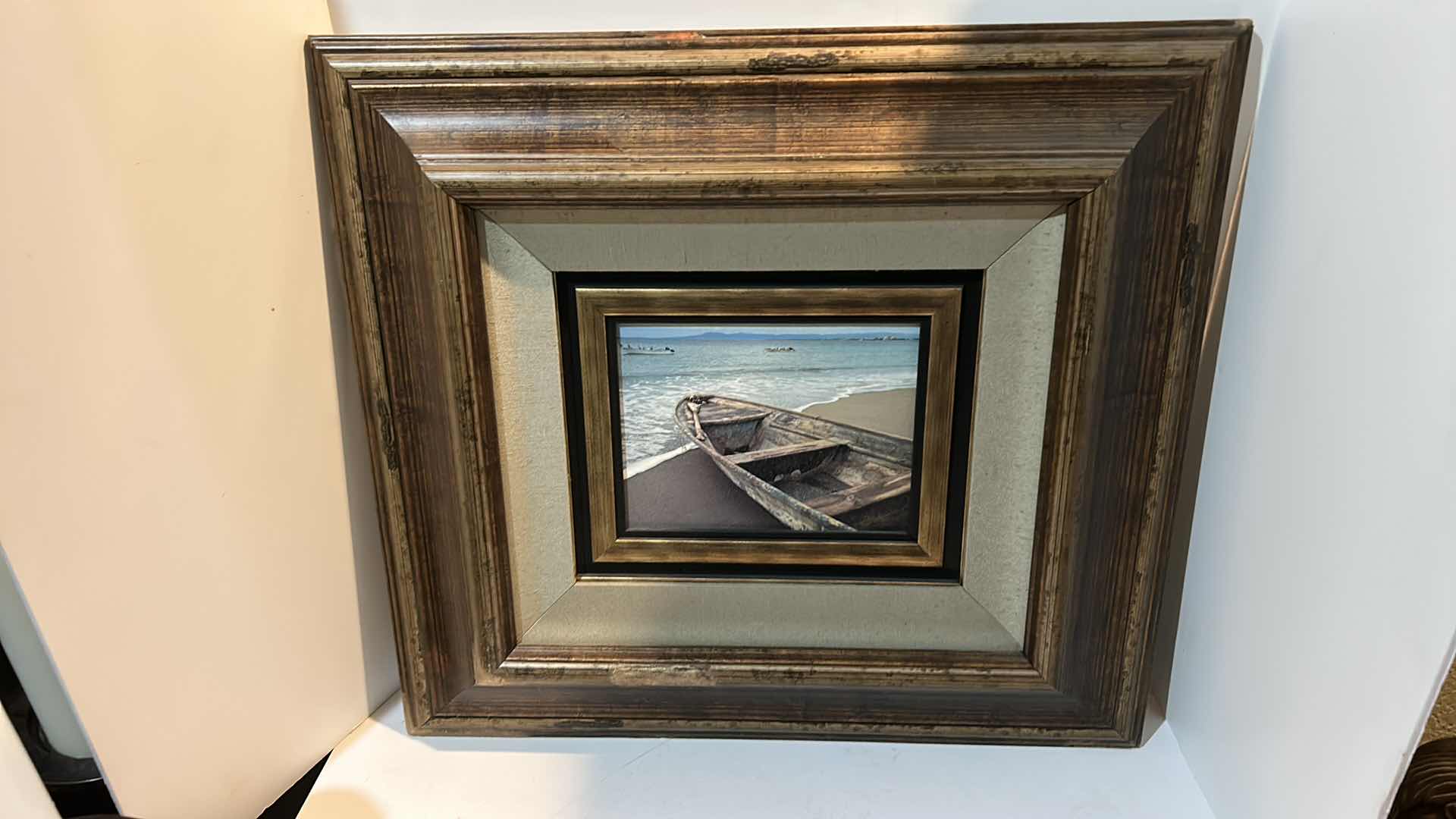 Photo 2 of WALL DECOR  -" BEACHED BOAT" ON SHORE ARTWORK IN WOOD FRAME 24” x 22”