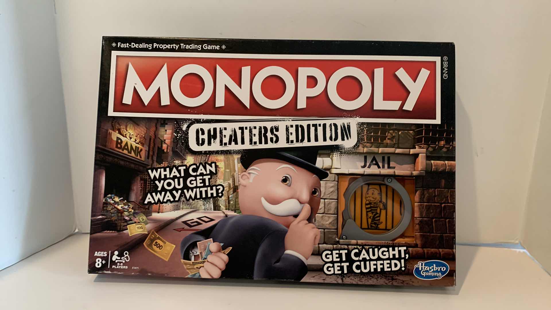 Photo 1 of MONOPOLY CHEATERS EDITION
