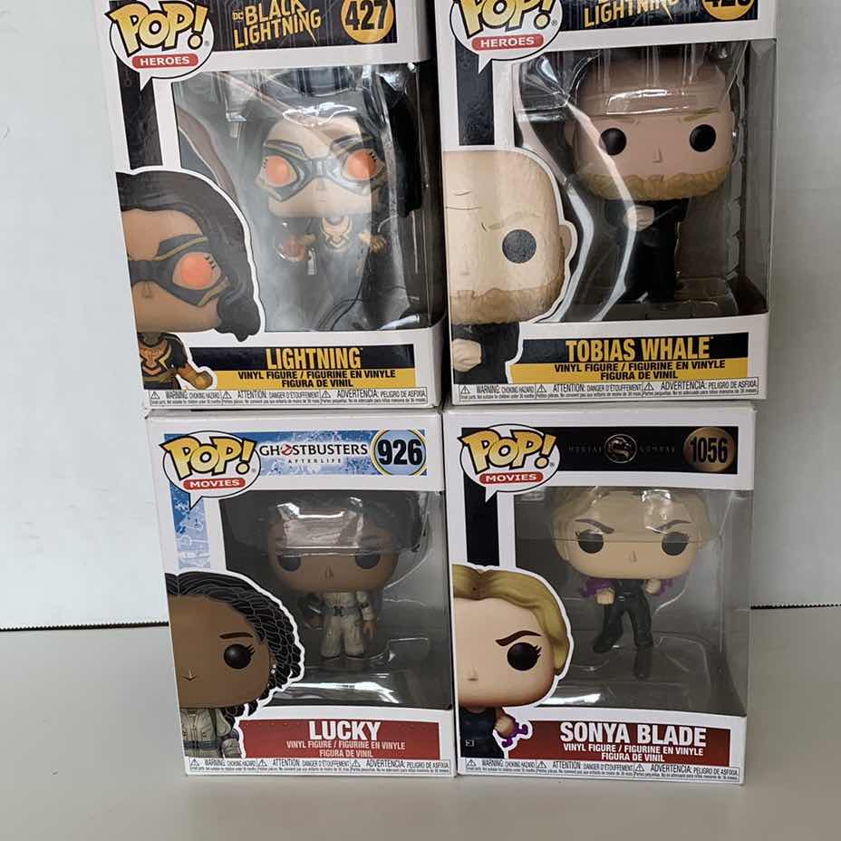 Photo 1 of FOUR FUNKO POPS BLACK LIGHTING, MIRTAL KOMBAT, AND GHOSTBUSTERS