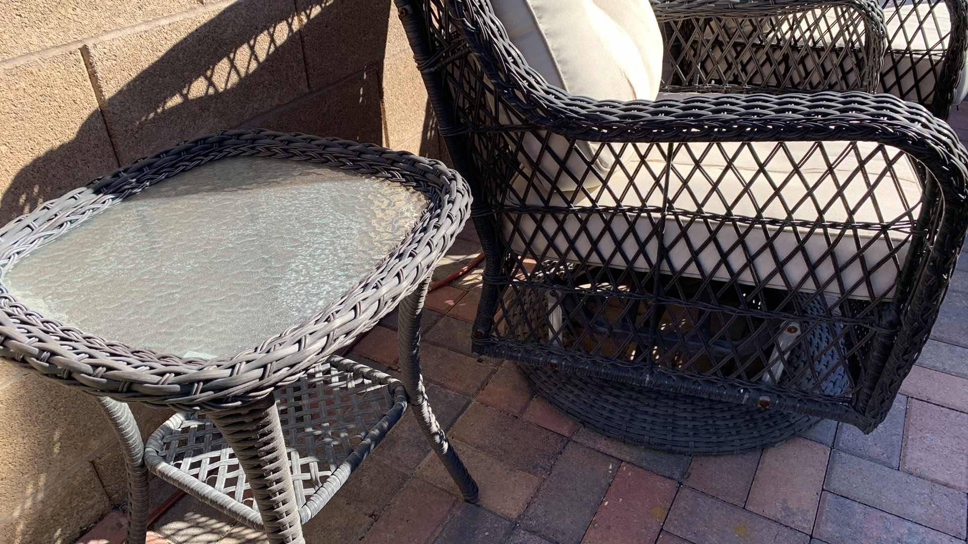 Photo 3 of TWO RATTAN GLIDER PATIO CHAIRS WITH MATCHING TABLE