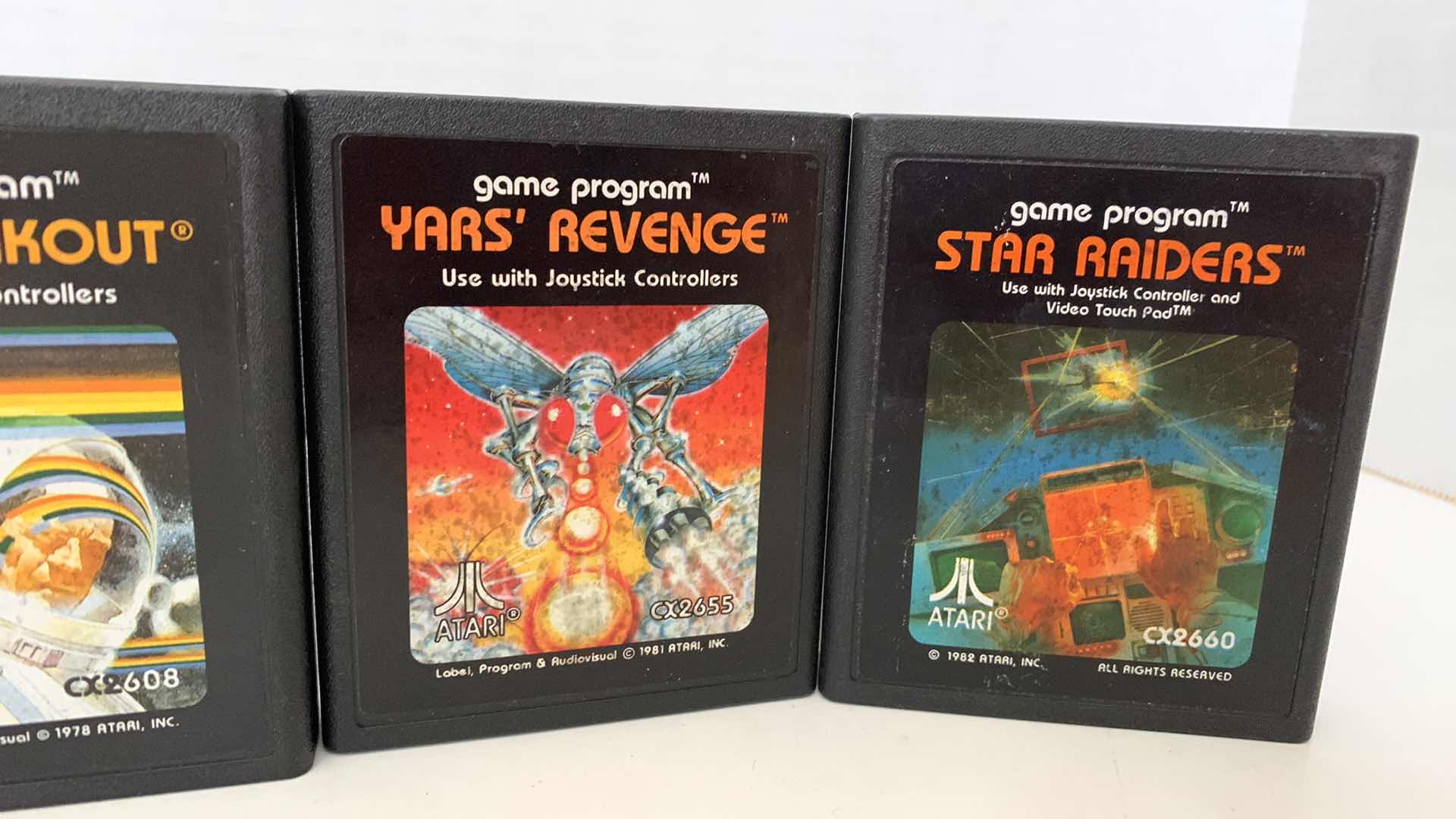 Photo 3 of 4 PCS VINTAGE ATARI 2600 GAMES:BERZERK,SUPER BREAKOUIT,YAR'S REVENGE, AND STAR RAIDERS